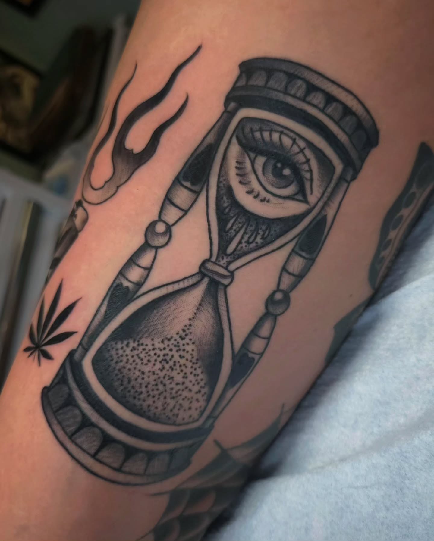 Hourglass with eye realism tattoo on the forearm by Justin Ballard, #Edmonds, Edmonds, Washington