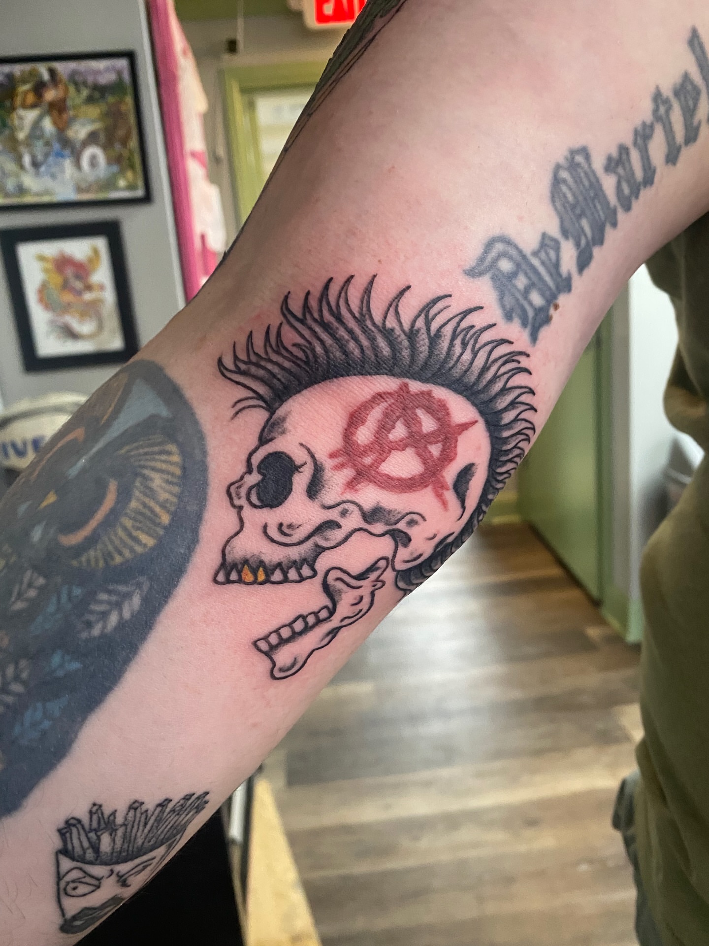 Punk skull American traditional tattoo on the forearm by Giuseppe T.C.