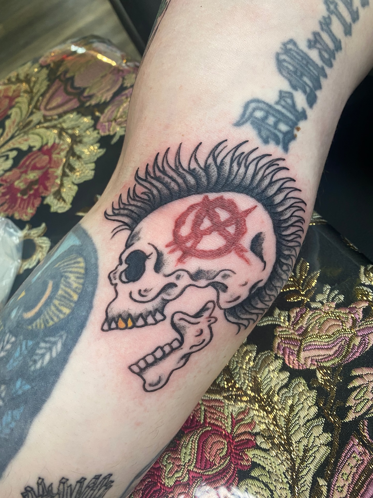 Punk skull American traditional tattoo on the forearm by Giuseppe T.C.