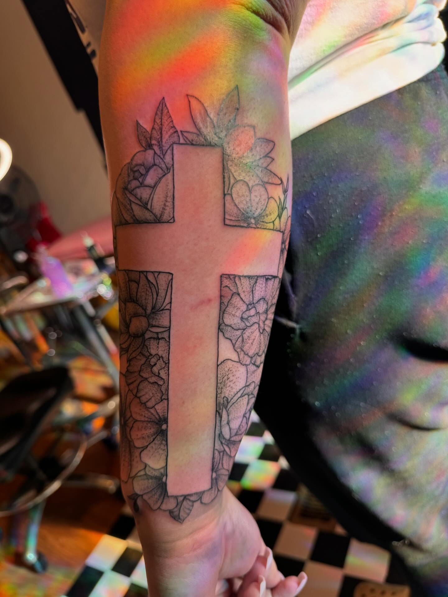 Cross with floral elements dotwork tattoo on the forearm by Gabs Borderline Tattoos βπΌ