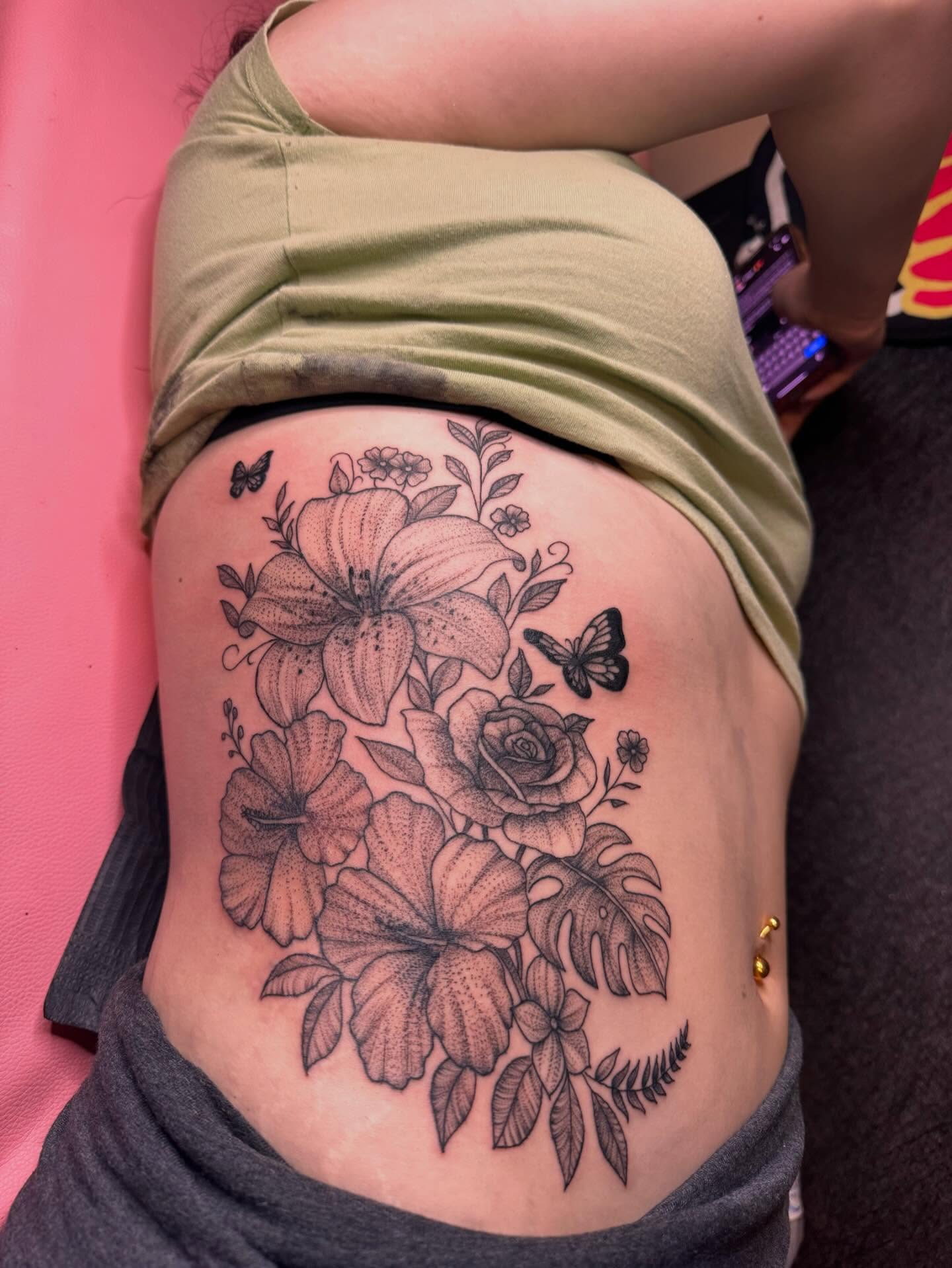 Floral bouquet black and grey tattoo on the thigh by Gabs Borderline Tattoos βπΌ