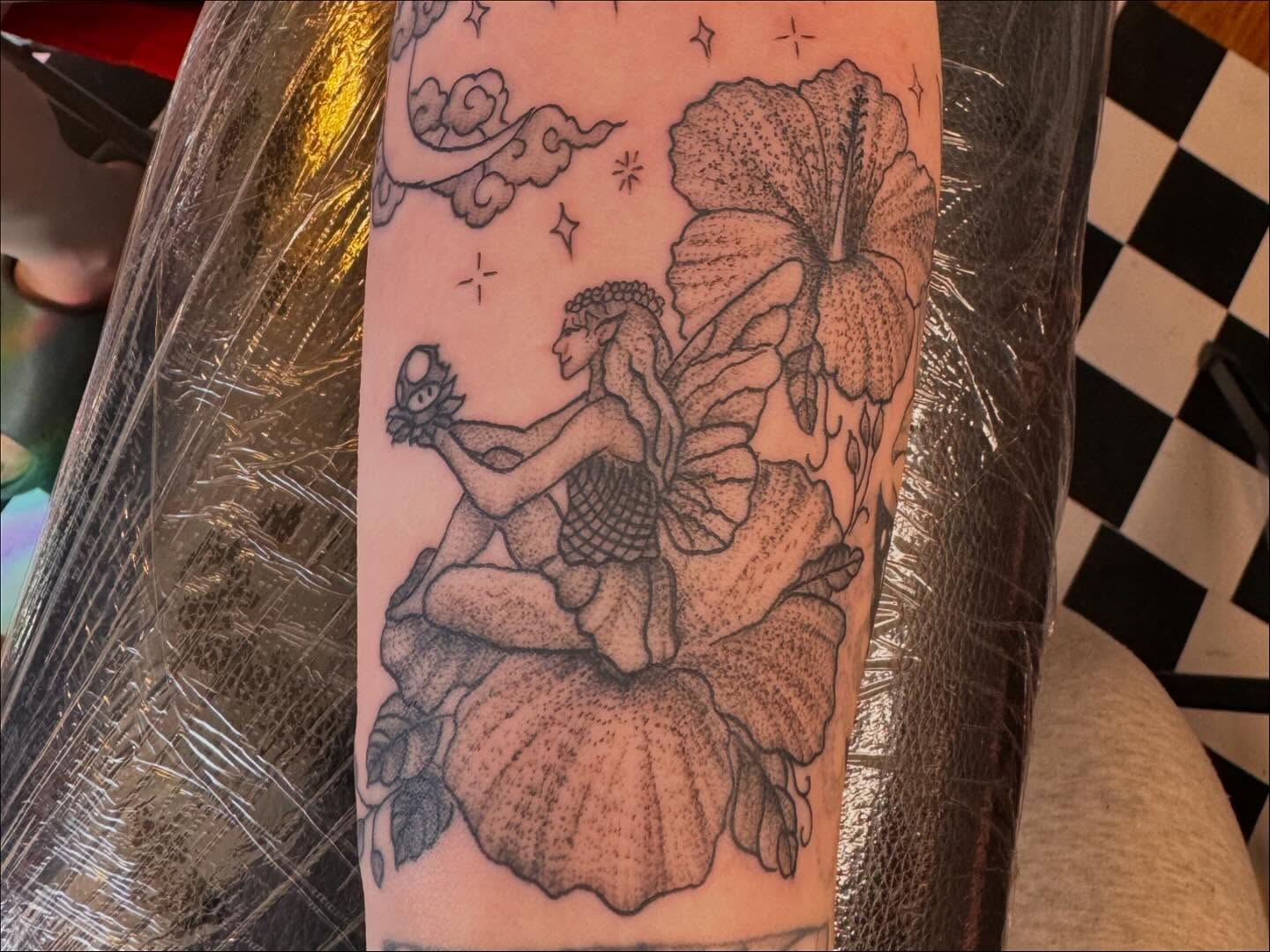 Mermaid and hibiscus dotwork tattoo on the forearm by Gabs Borderline Tattoos βπΌ