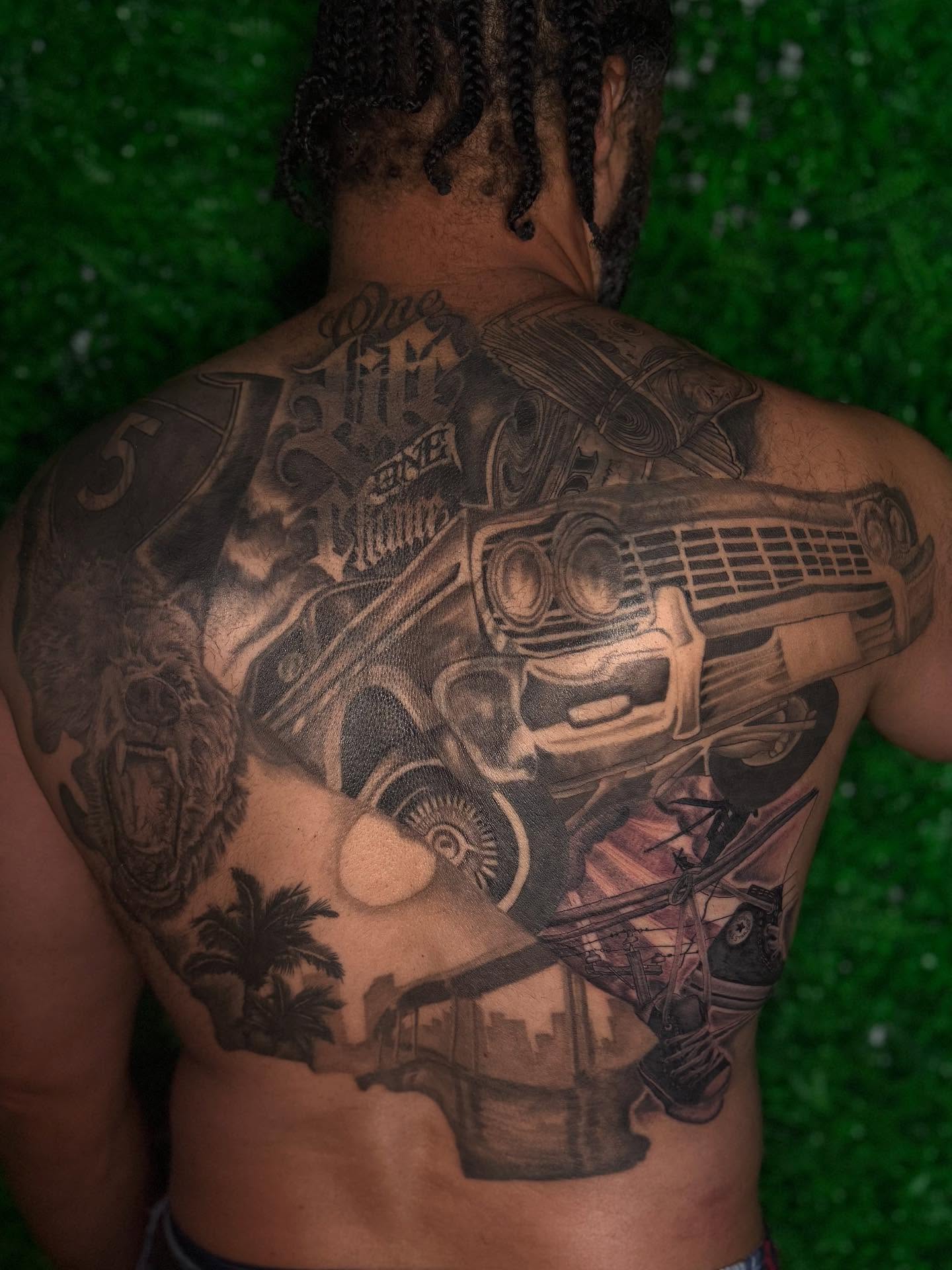 Muscle car black and grey tattoo on the back by Los Angeles Tattoo Artist