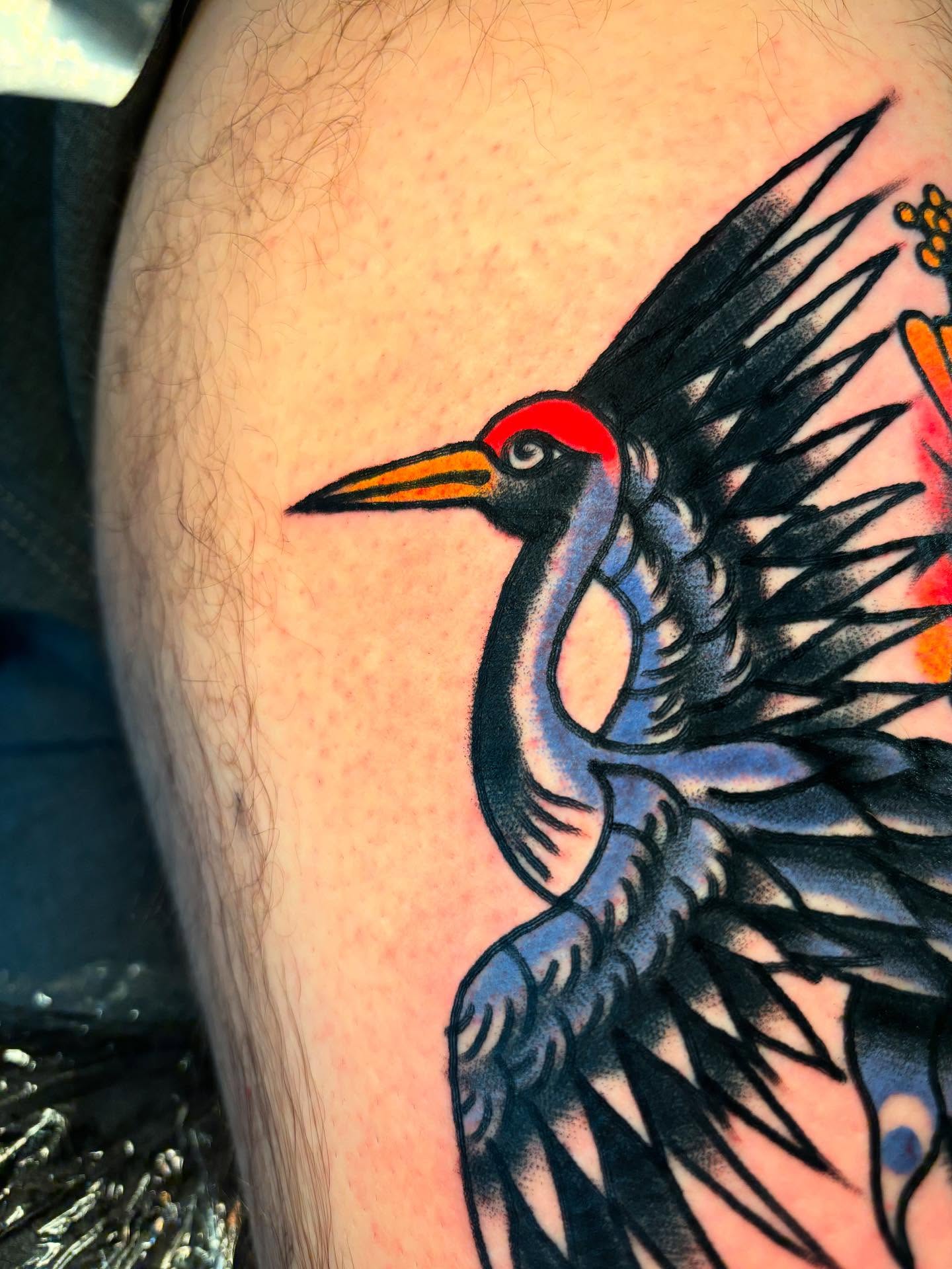 Woodpecker American traditional tattoo on the thigh by Nick