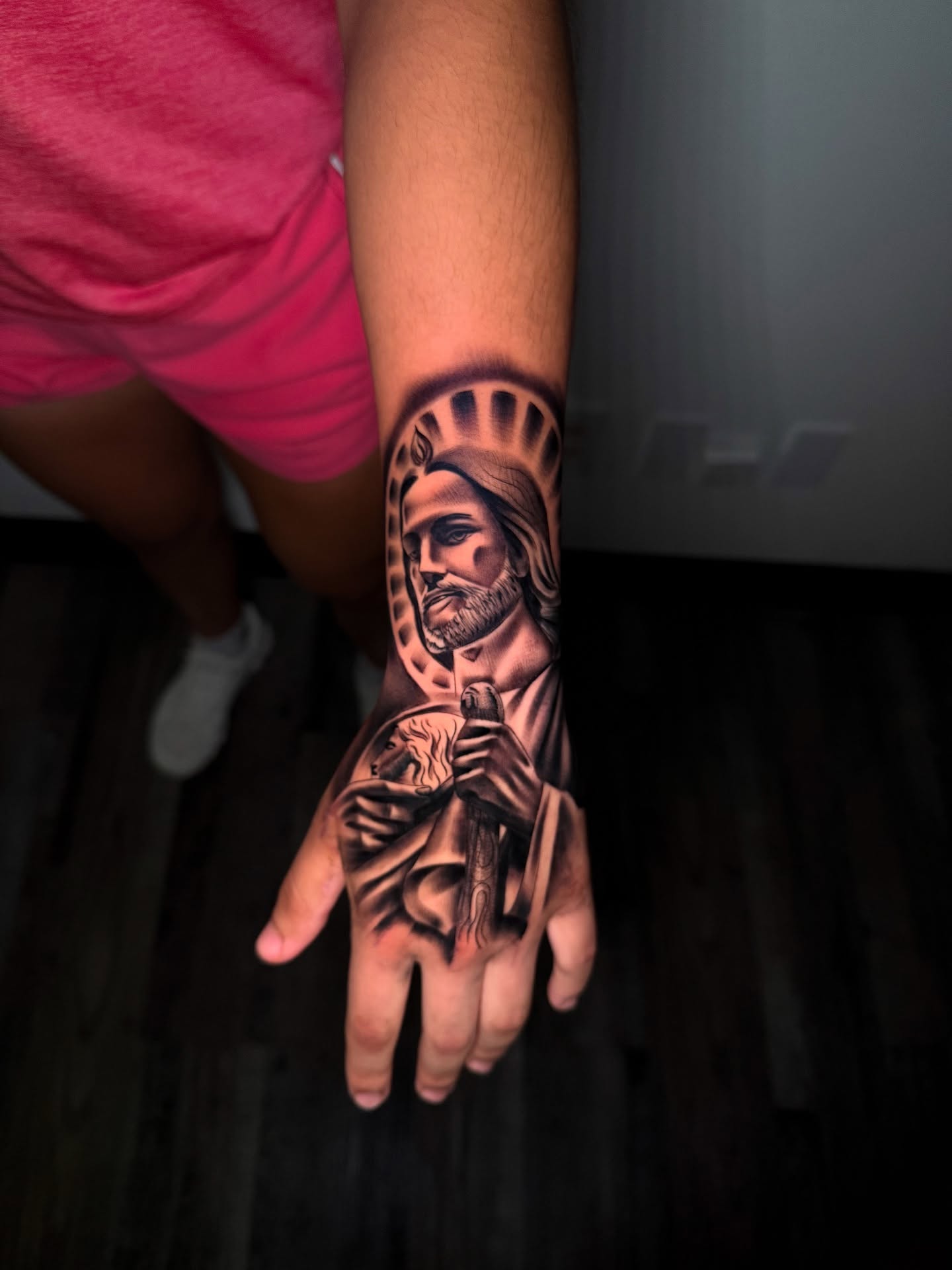 Religious figure realism tattoo on the hand by Aaron Saenz jr