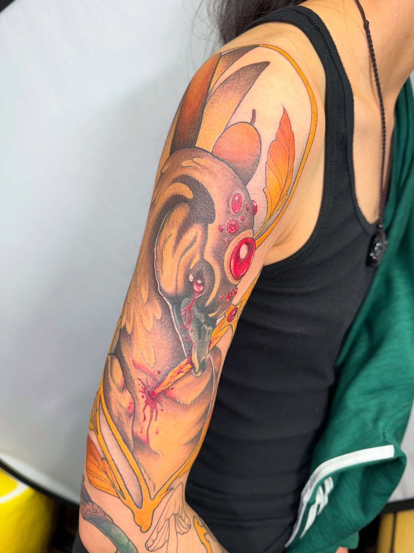 Fish realism tattoo on the upper arm by Maia Papaya Tattoos 🐝 Olympia Tattoo Artist
