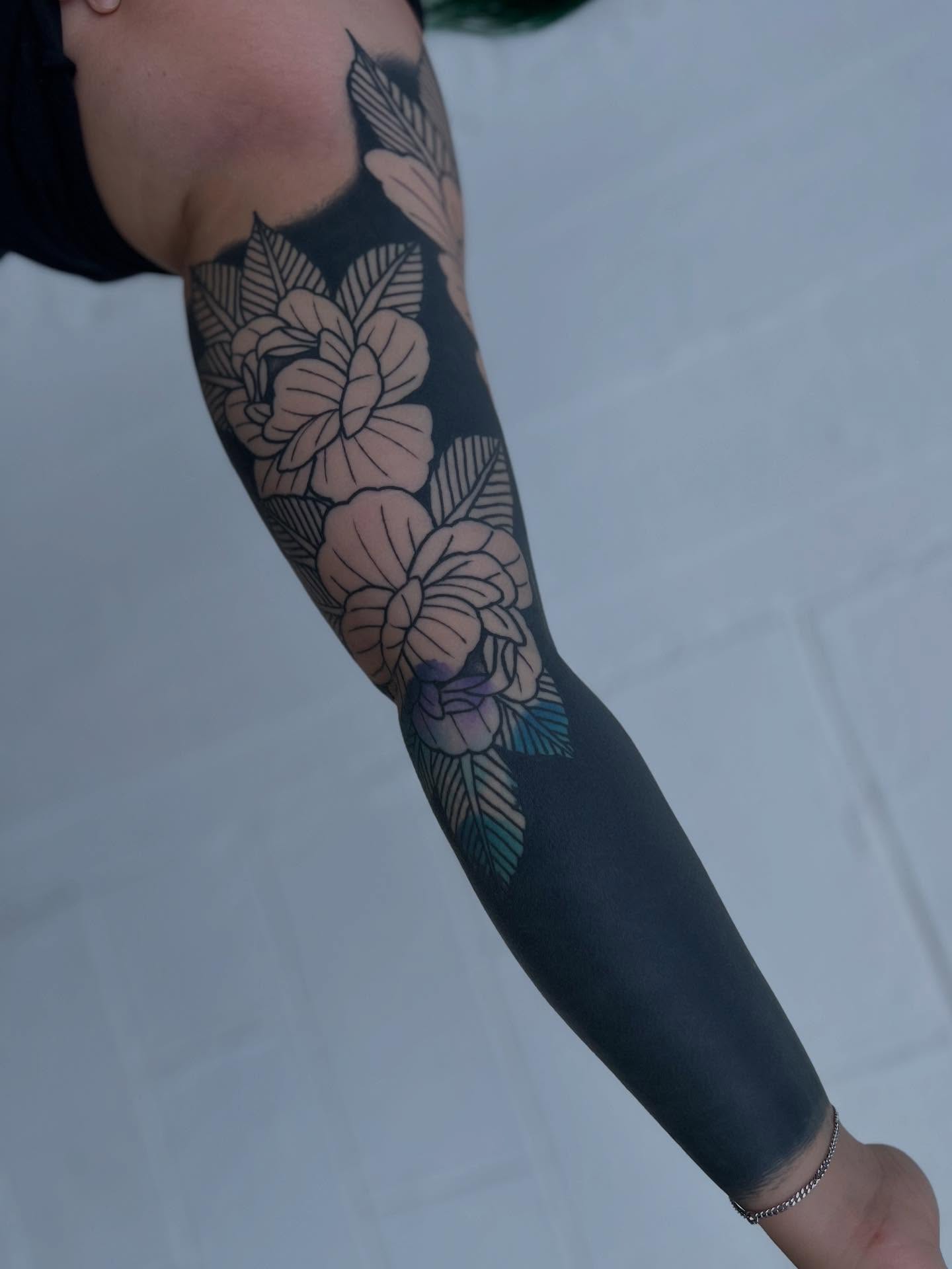 Floral arrangement black and grey tattoo on the forearm by Blake Francis, Worcester, Massachusetts
