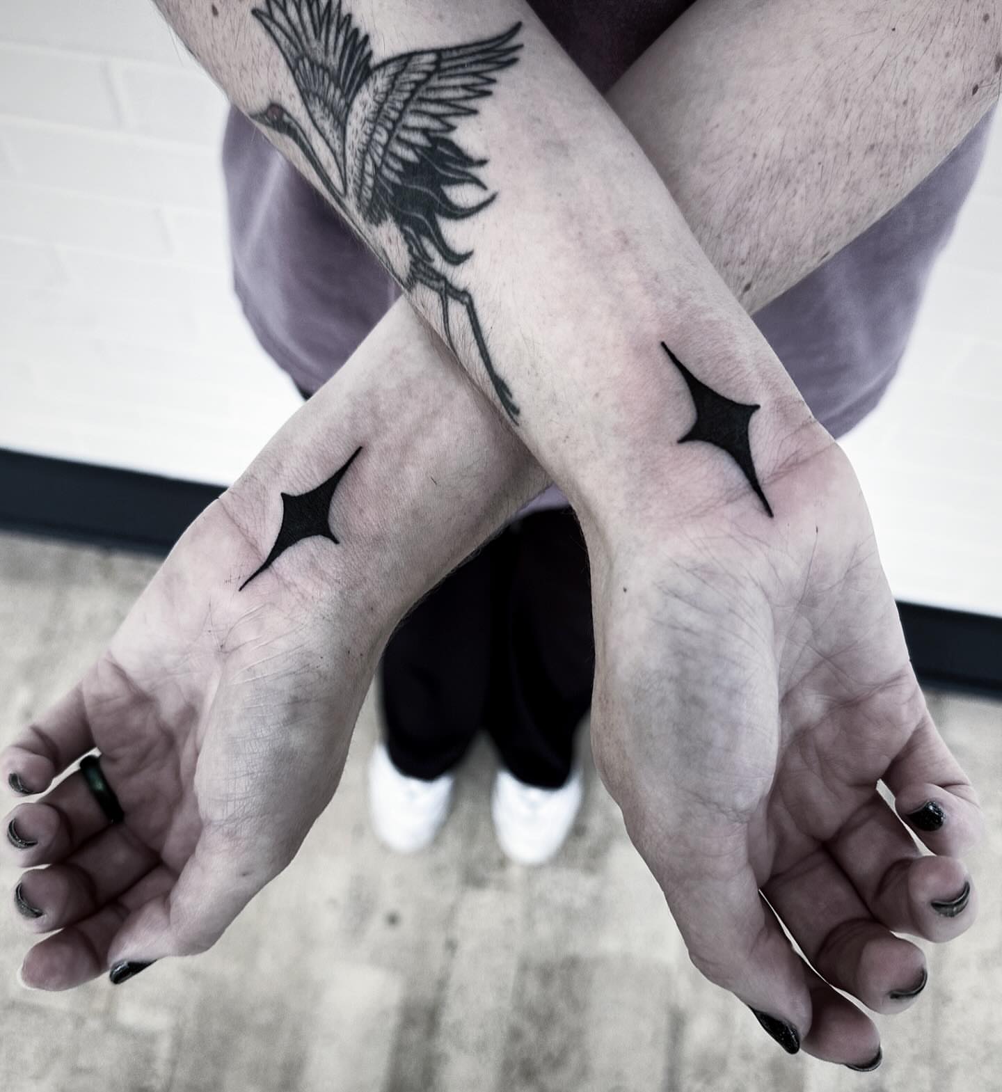 Bird and star black and grey tattoo on the forearm by 🕸 ᴠɪᴠɪᴀɴ ʟᴏʀᴇ 🕸, Nashville, Tennessee