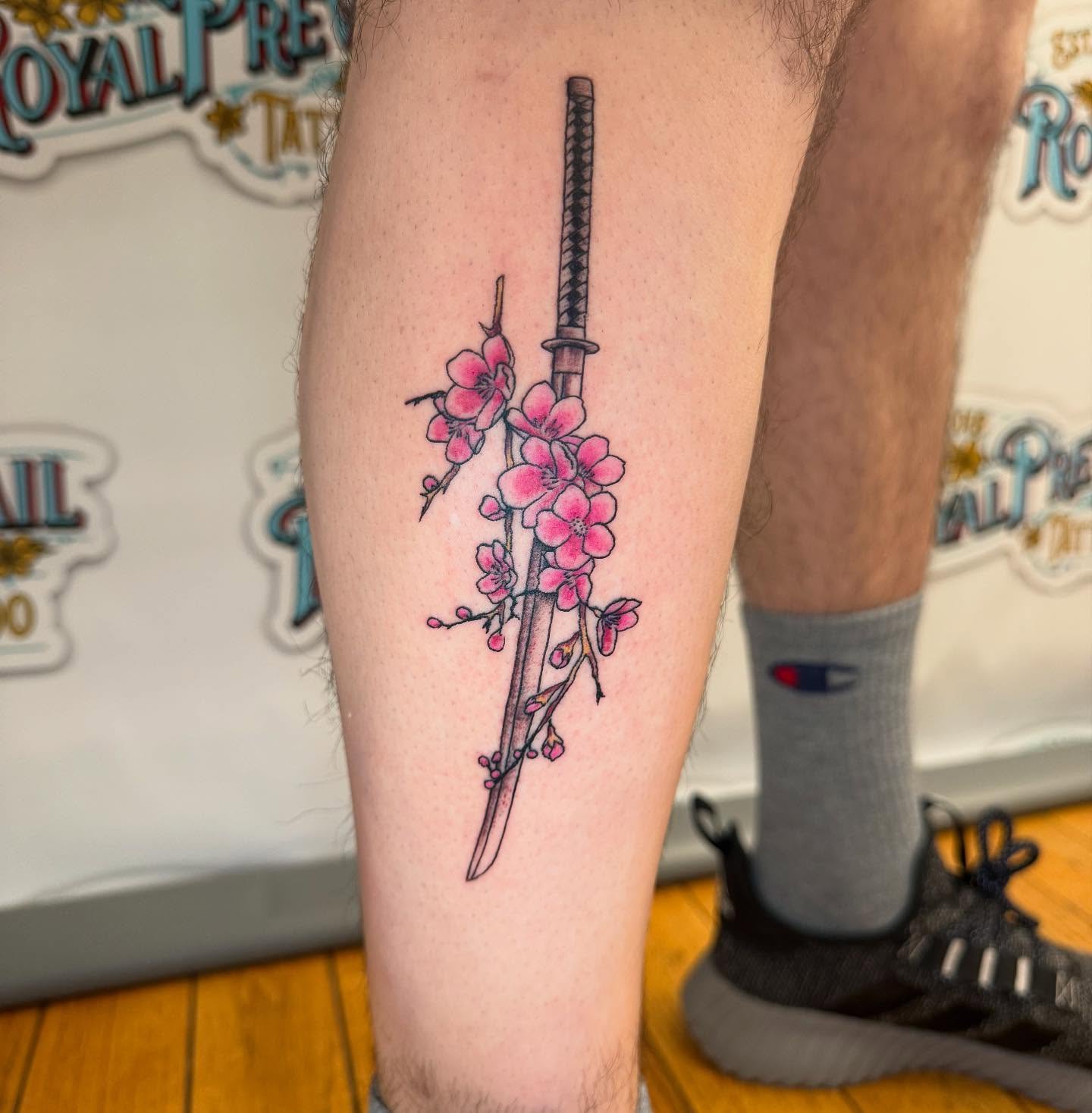 Cherry blossoms and katana dotwork tattoo on the forearm by Paul Calhoun Tattoos, Englewood, Ohio