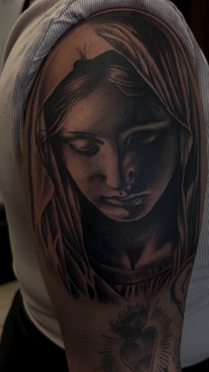 Virgin Mary portrait realism tattoo by Thomas