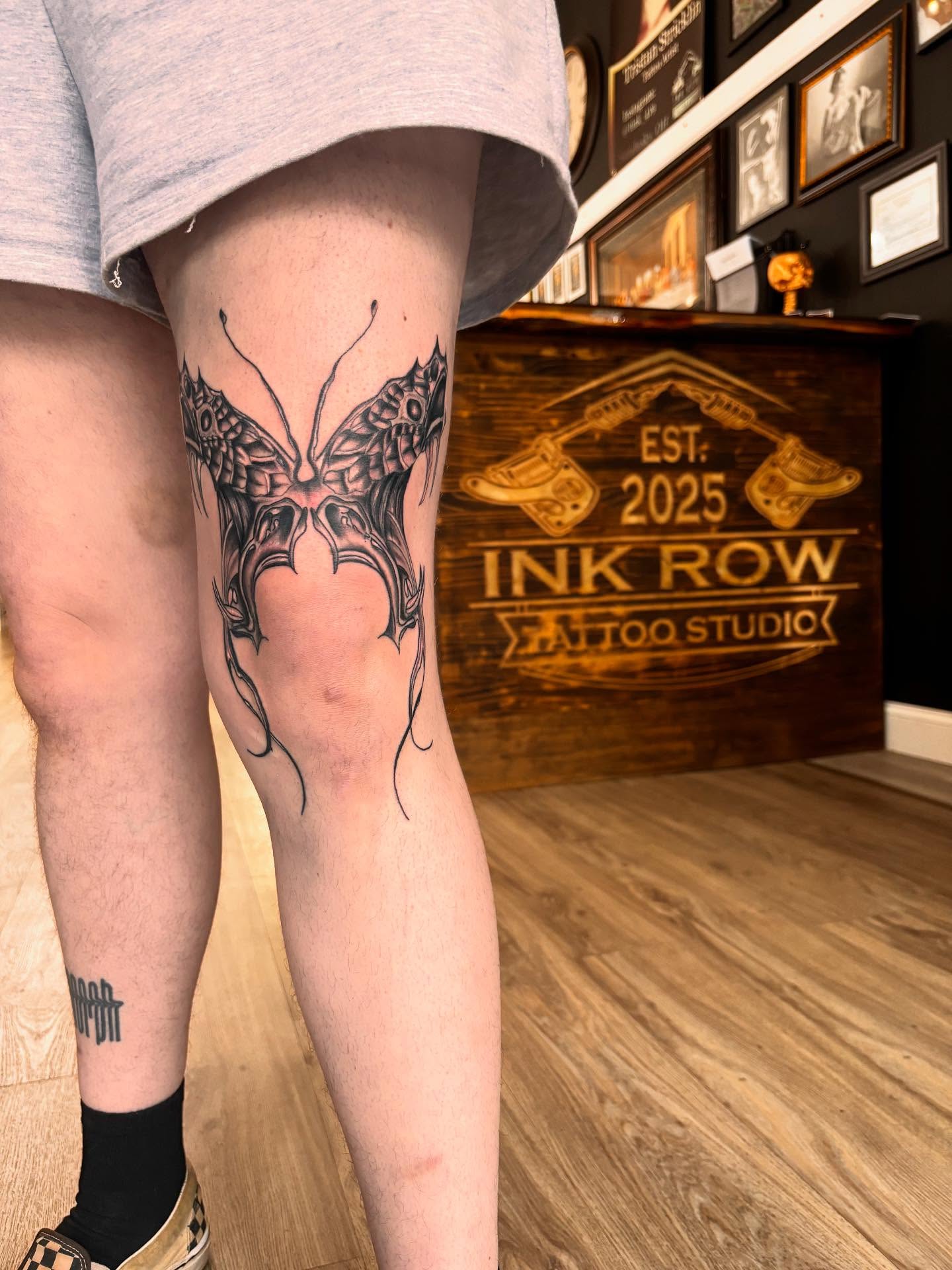 Butterfly black and grey tattoo on the thigh by Alyssa Turner