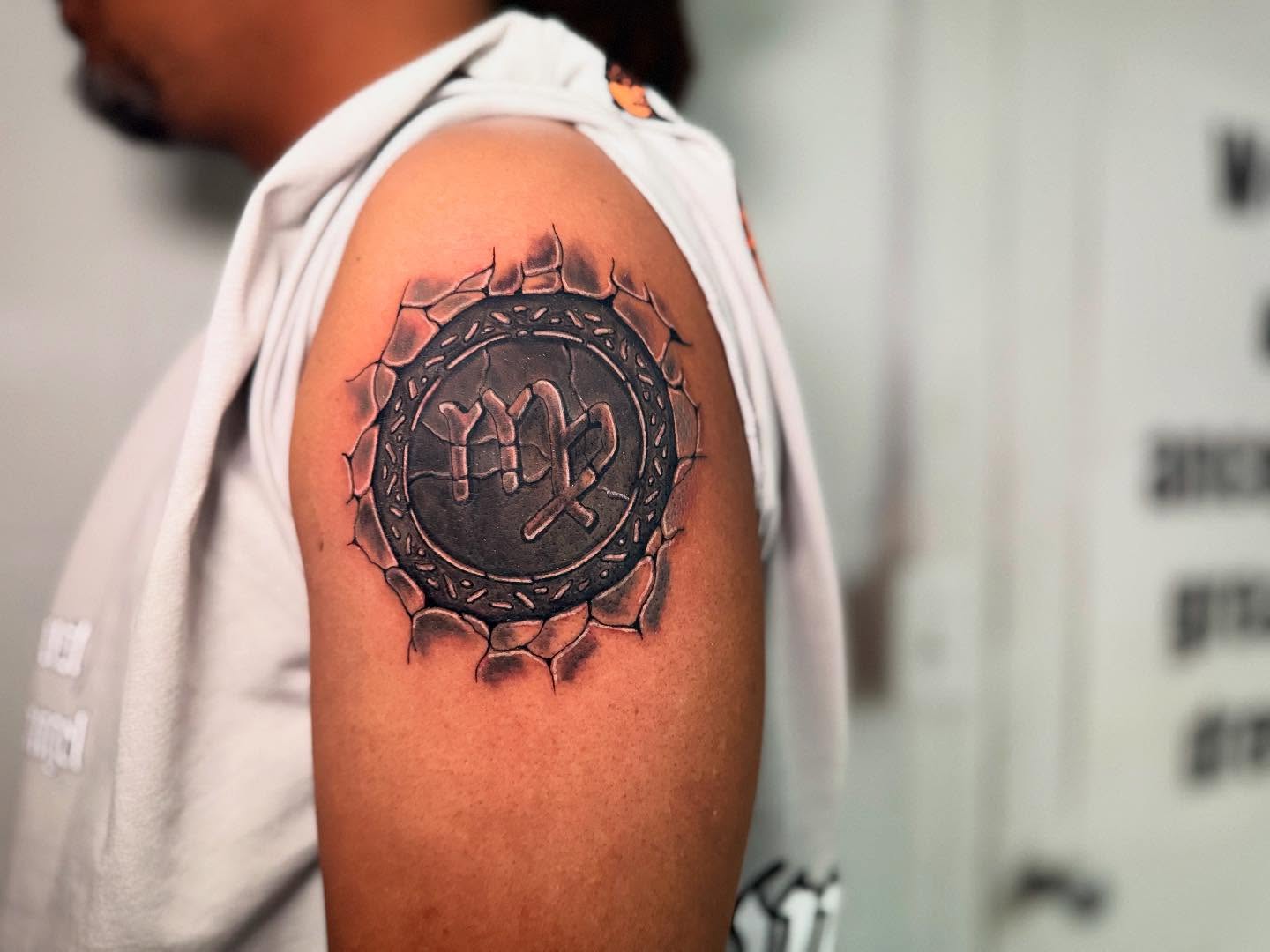 Vintage seal black and grey tattoo on the shoulder by dotMX