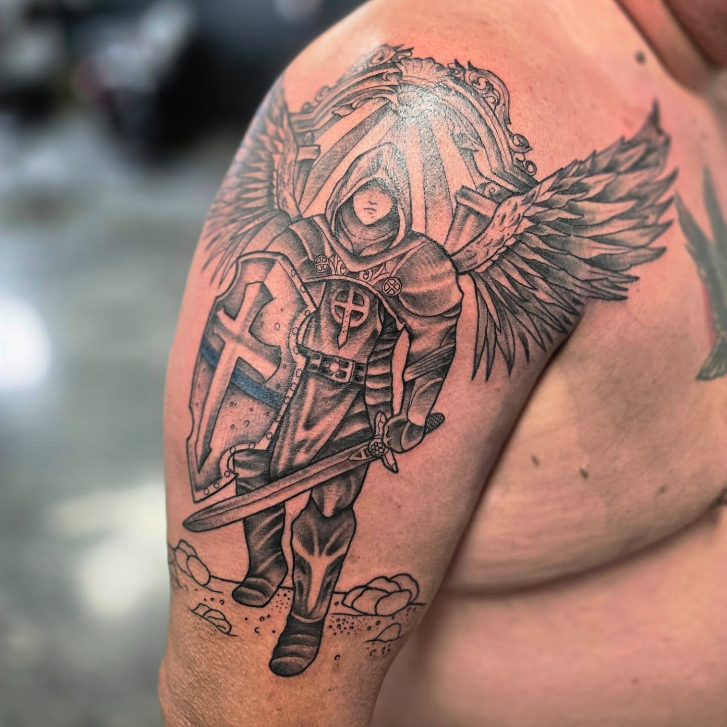 Knight with wings realism tattoo on the shoulder by Jon Griffin, Maryville, Tennessee