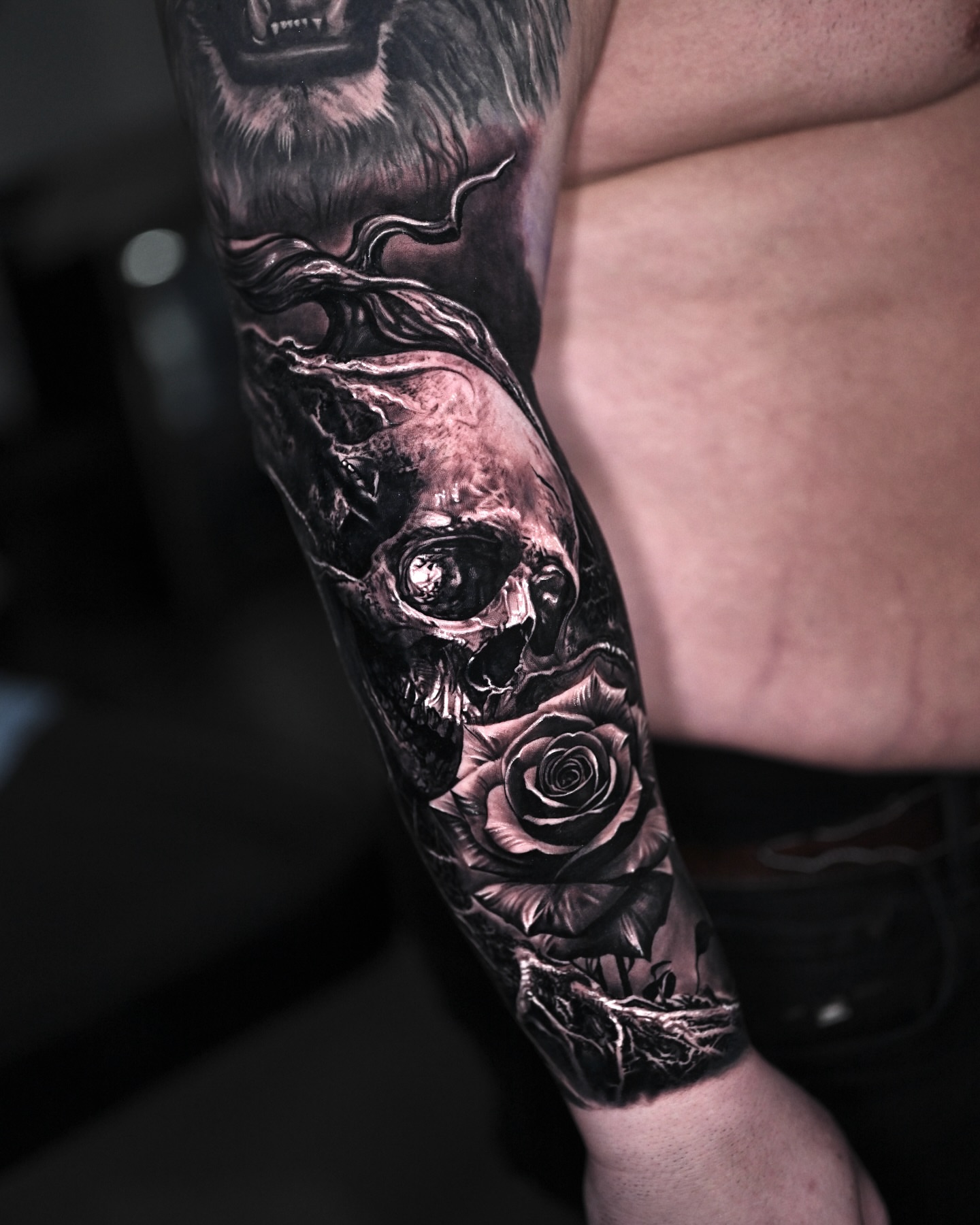 Skull and rose realism tattoo on the forearm by Marcos Salamanca