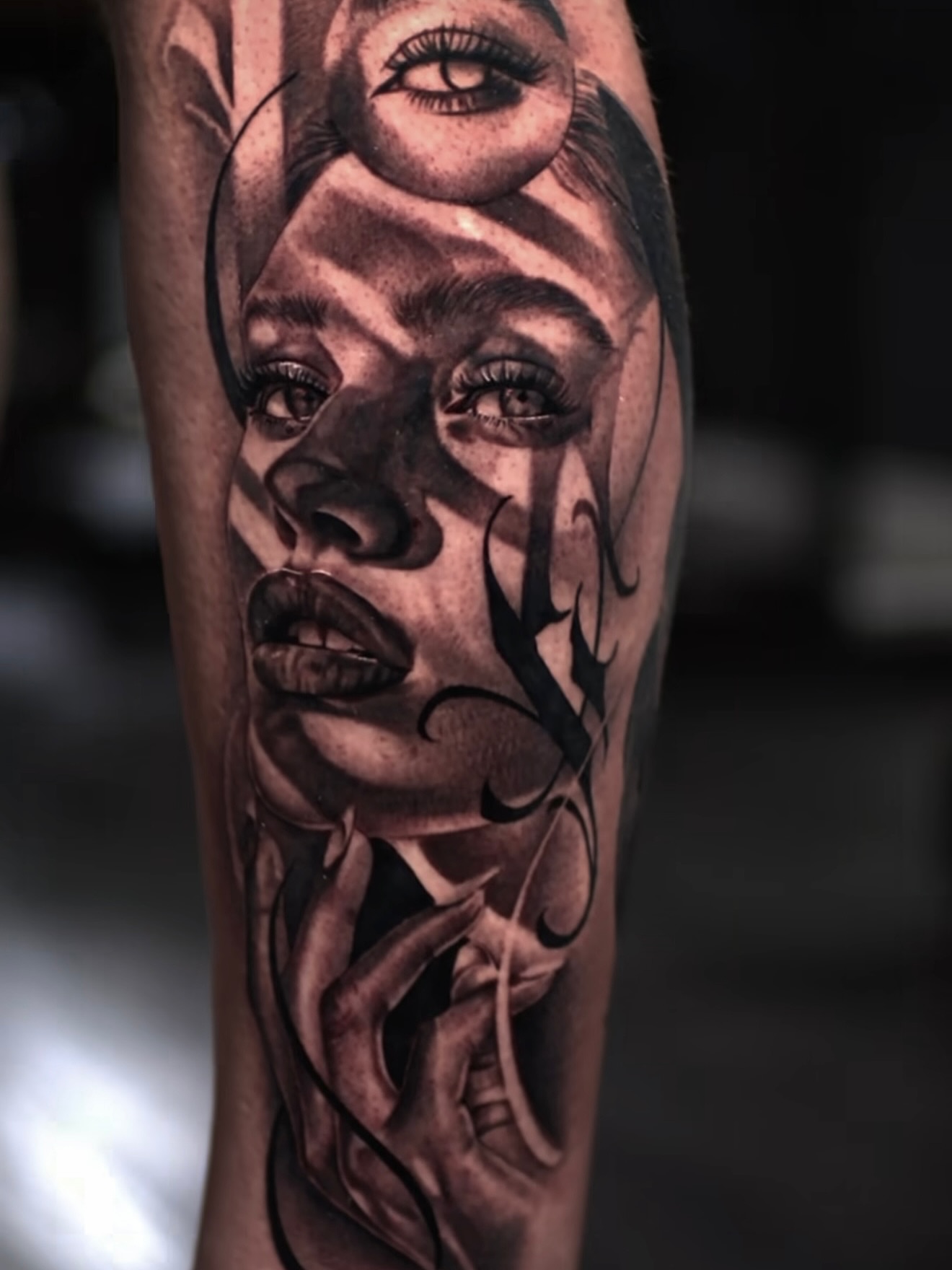 Woman's face realism tattoo on the forearm by Becky Lee Cameron