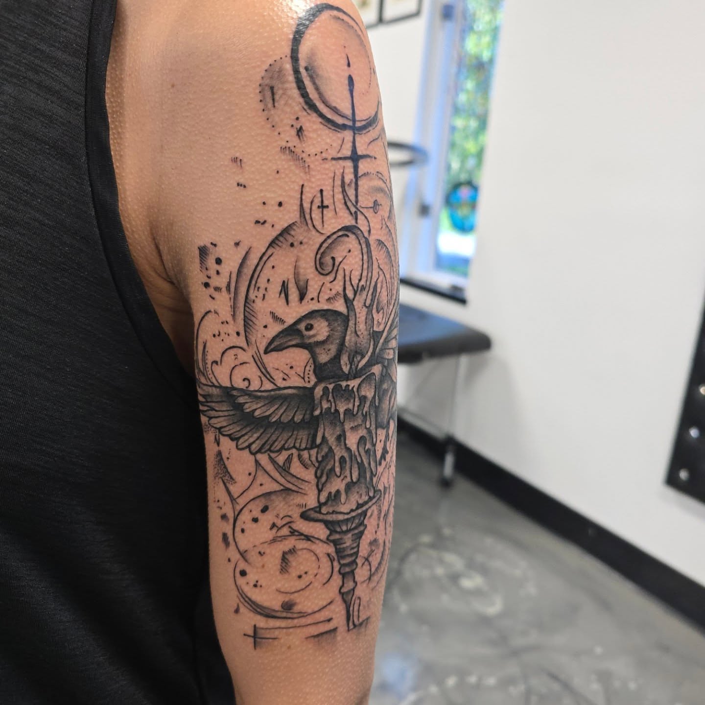 Crow and skull dark realism tattoo on the forearm by Jon Griffin, Maryville, Tennessee