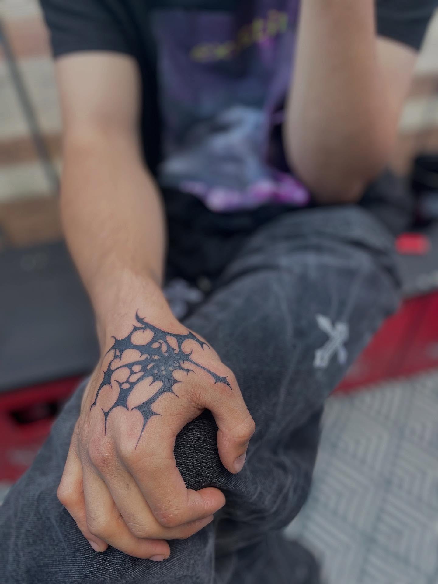 Spiky plant black and grey tattoo on the hand by lu ๐