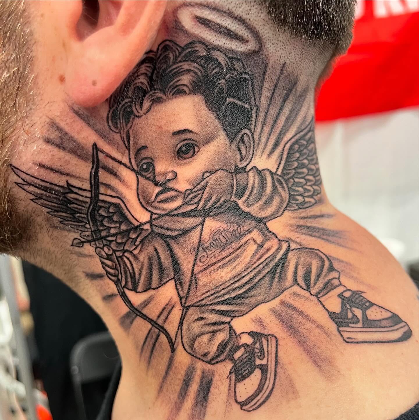 Angelic child realism tattoo on the neck by F e A R