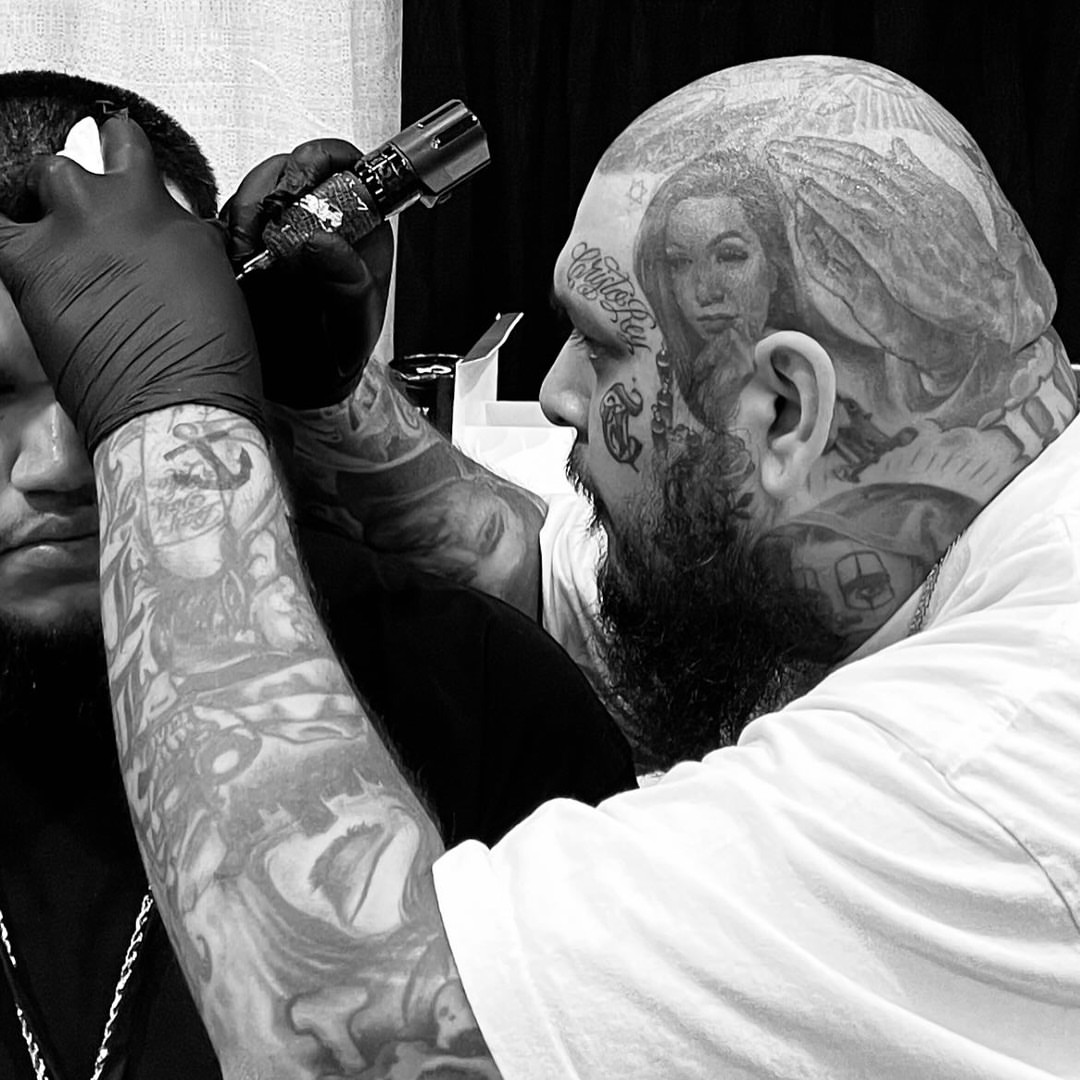 Woman's face black and grey tattoo on the head by F e A R