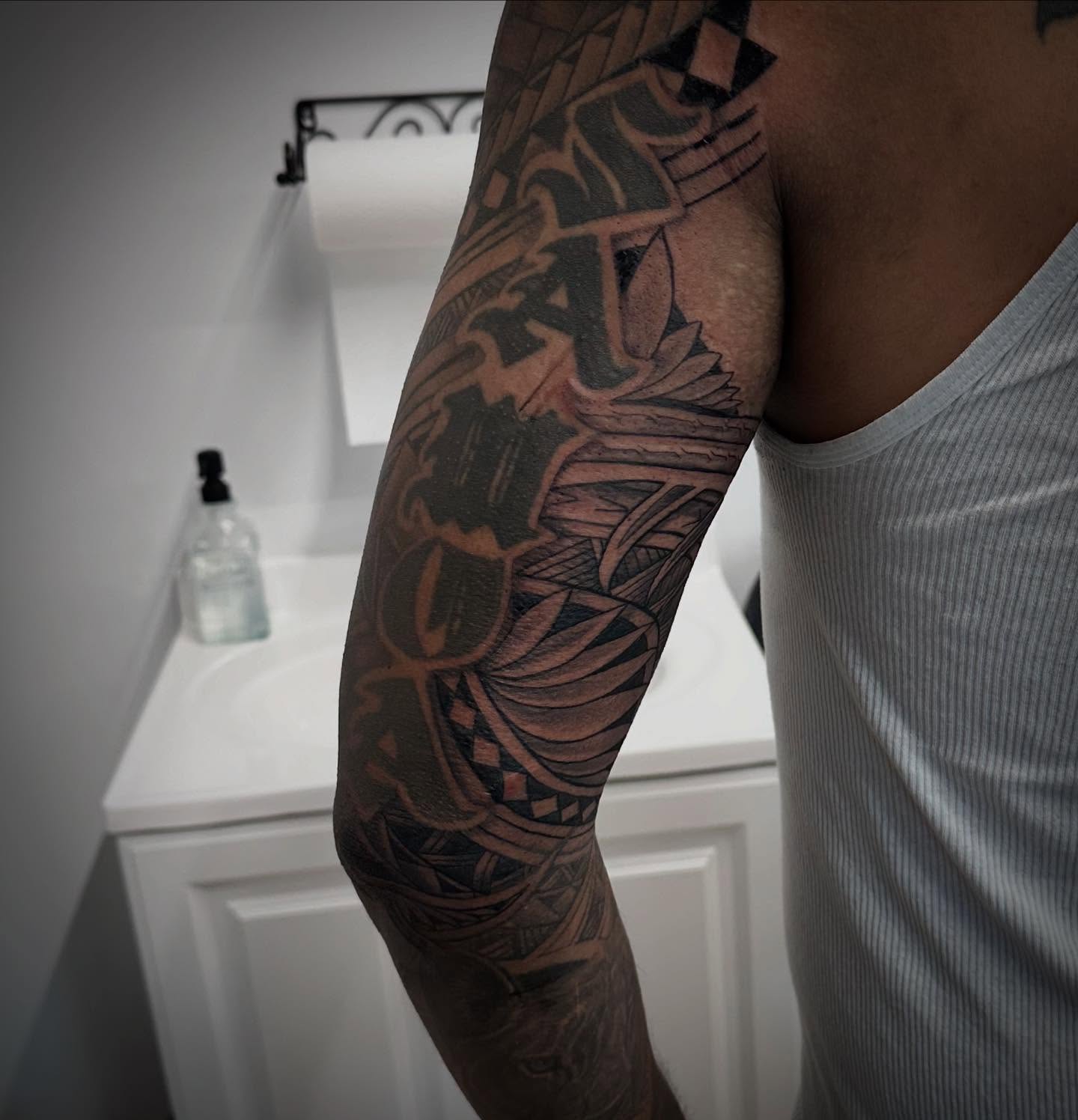 Tribal pattern tribal tattoo on the forearm by Teddi Bird