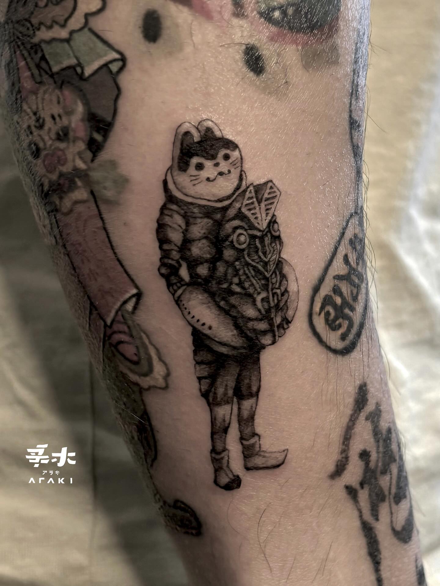 Tattoo by @araki_tattoo — black_and_grey