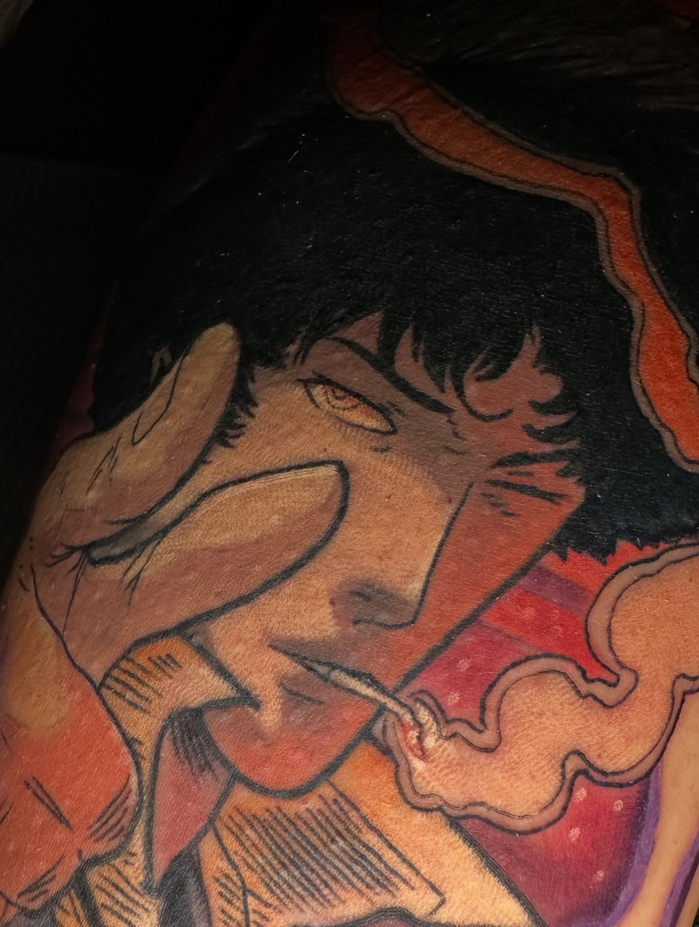 Smoking man realism tattoo on the upper arm by Robert Douglas