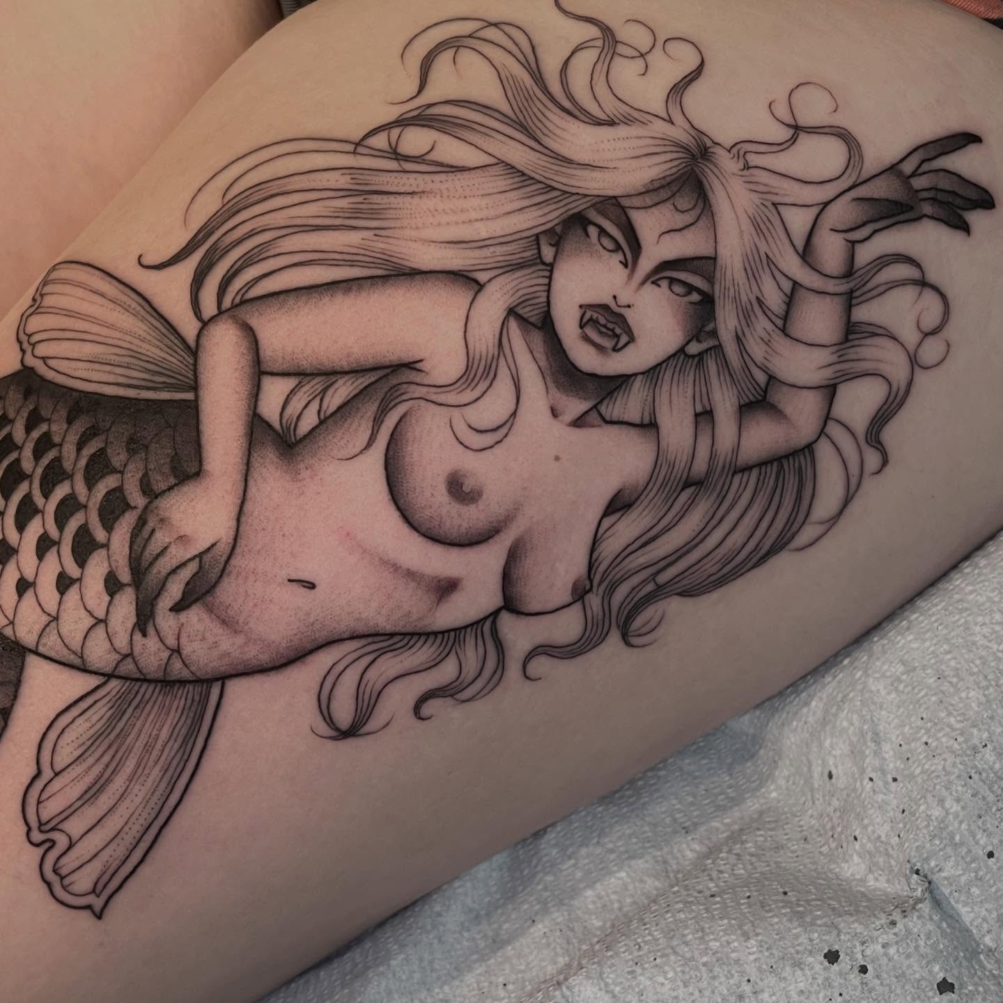 Mermaid black and grey tattoo on the thigh by Amanda Marie, Edmonds, Washington