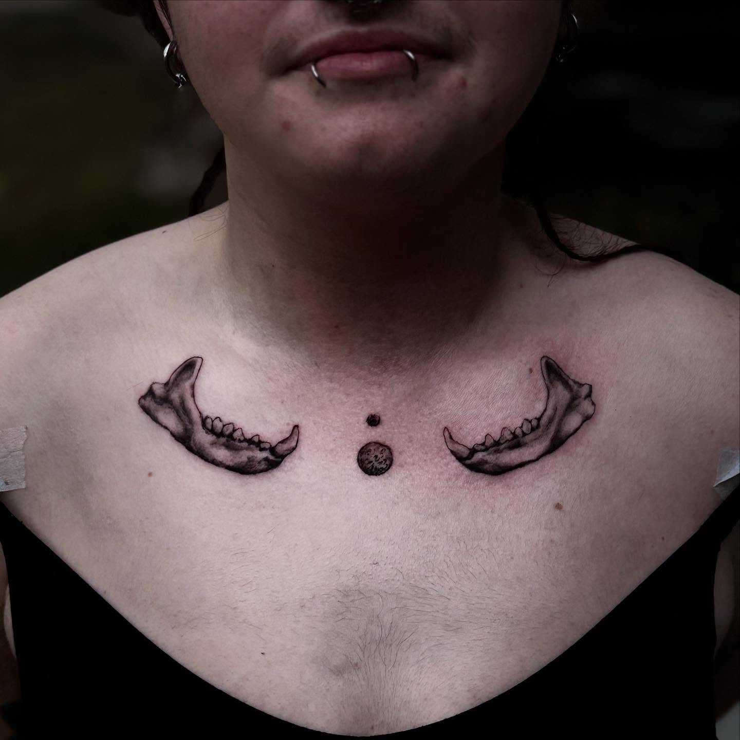 Teeth and moon dotwork tattoo on the chest by Cullen-Lee
