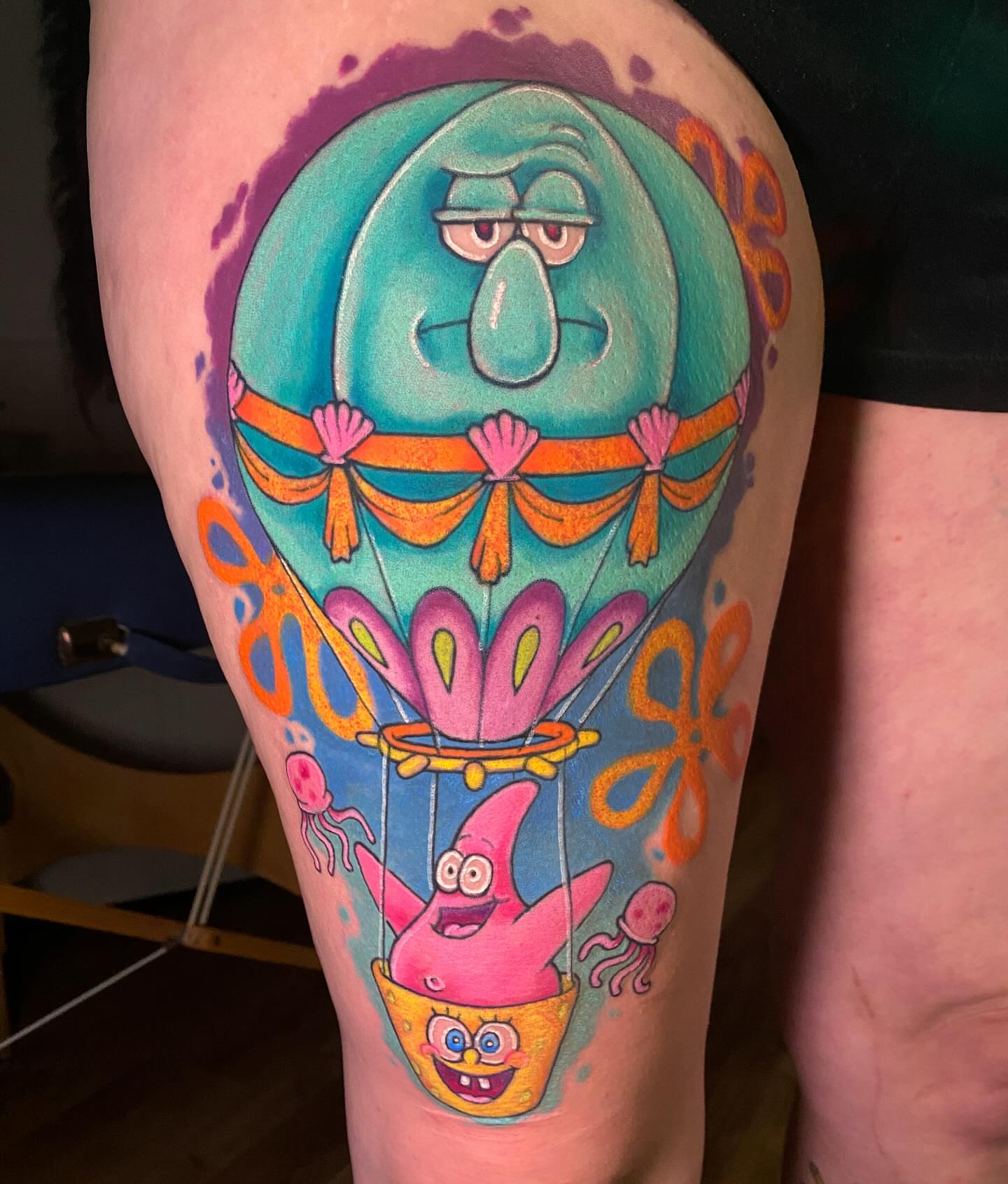 Patrick in hot air balloon new school tattoo on the thigh by Loki Shane DeFriece