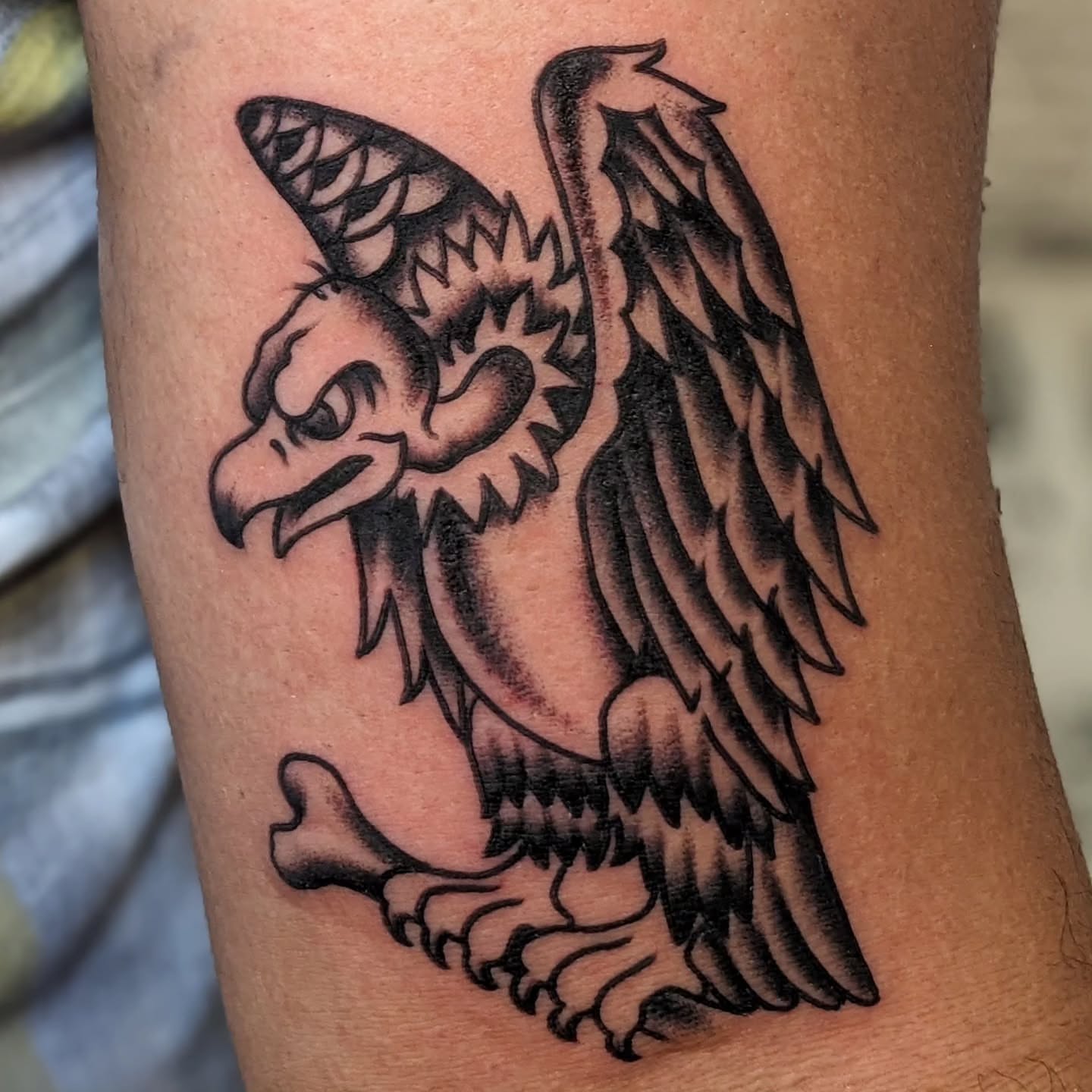 Eagle black and grey tattoo on the forearm by Matt Simmonds
