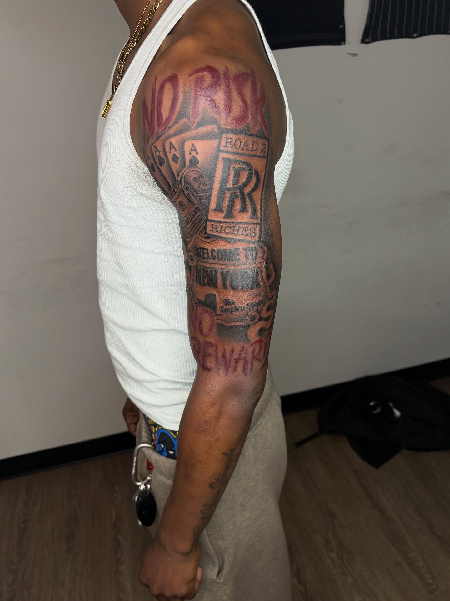 Road to riches American traditional tattoo on the forearm by Vonte Seay