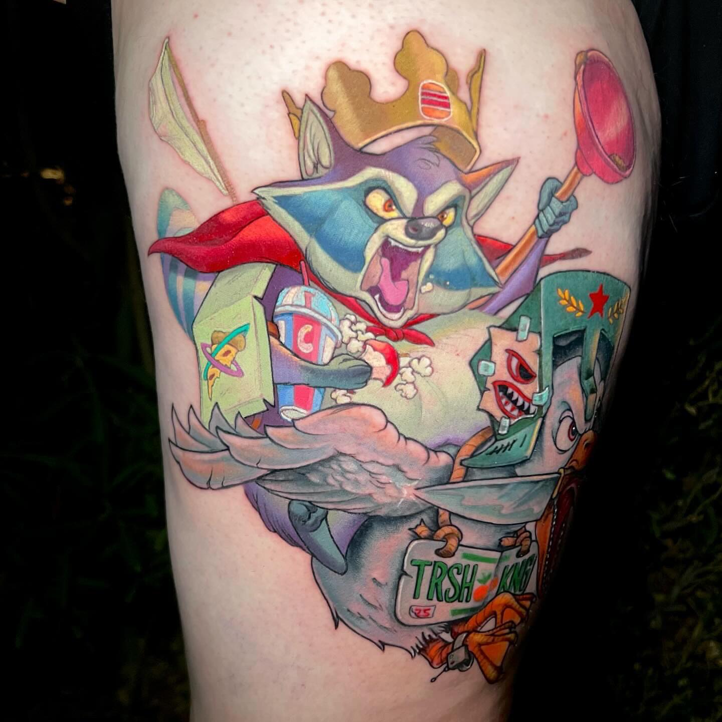 Robin the raccoon new school tattoo on the thigh by Tim Stafford
