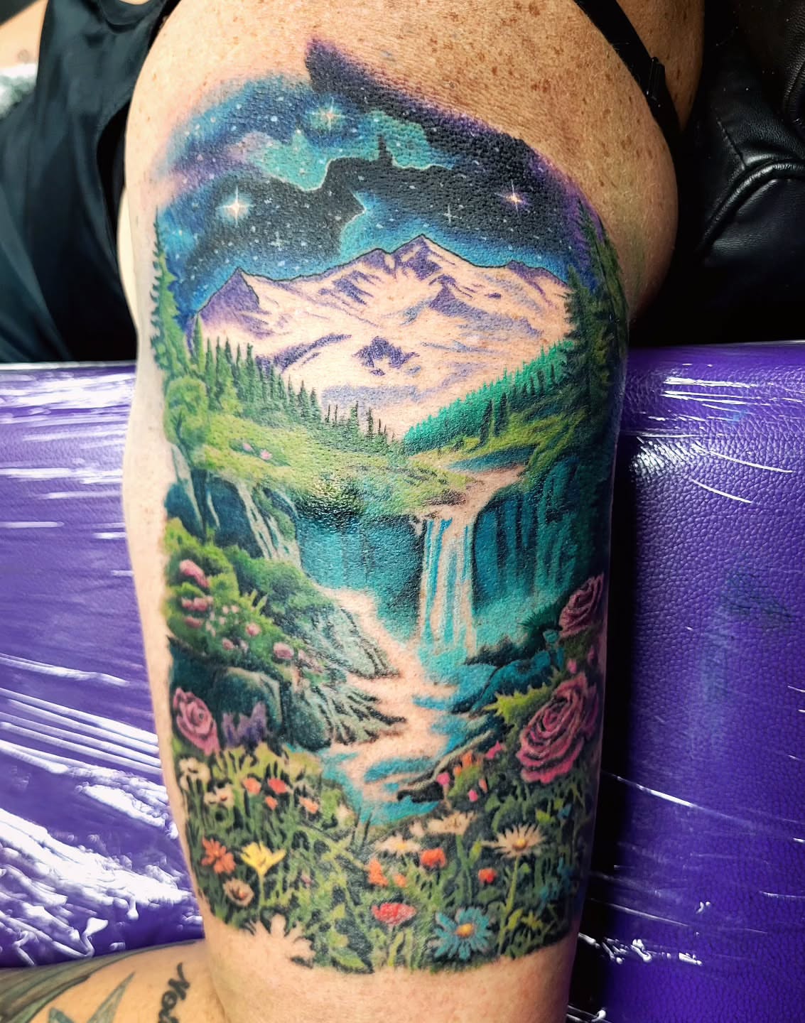 Mountain landscape realism tattoo on the thigh by Jentrey McCausland