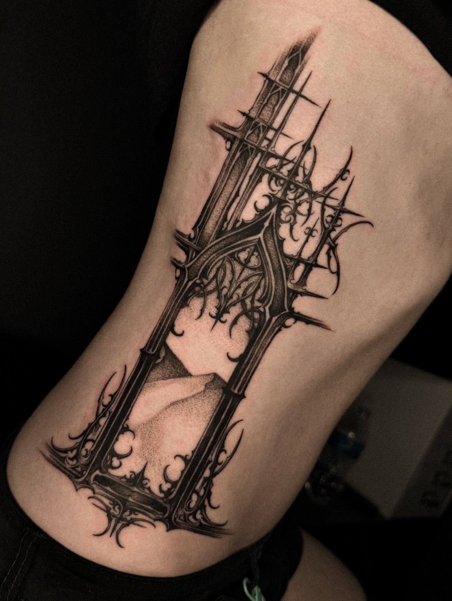 Gothic cathedral geometric tattoo on the thigh by David Ha