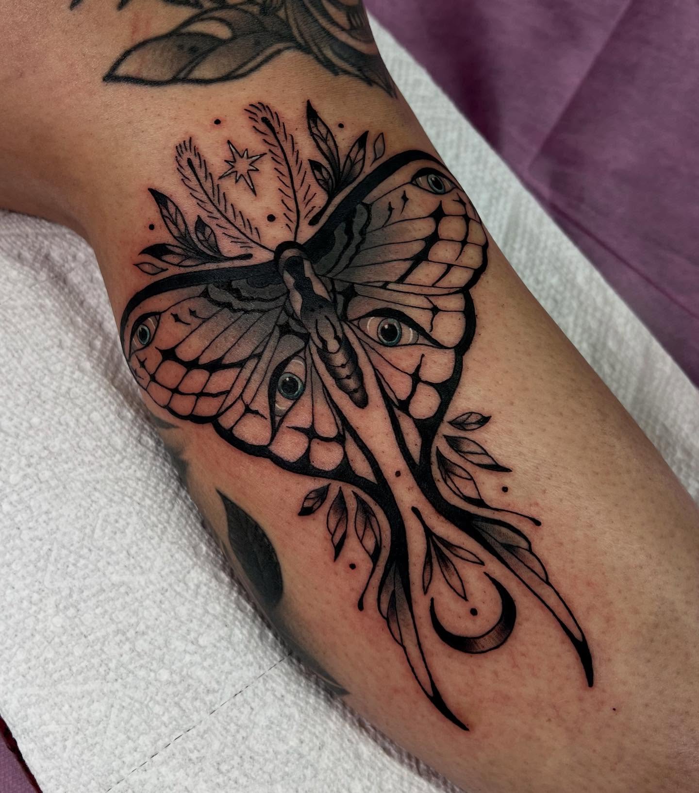 Butterfly geometric tattoo on the forearm by Kahlan ⍟