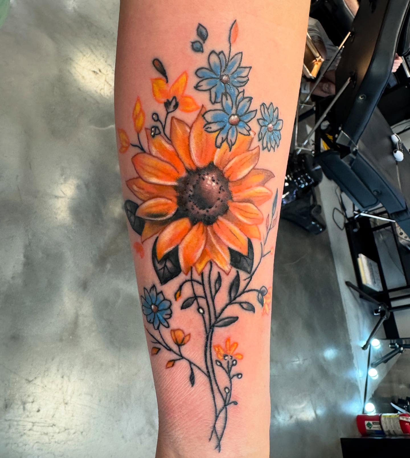 Sunflower realism tattoo on the forearm by spikecitytattoo