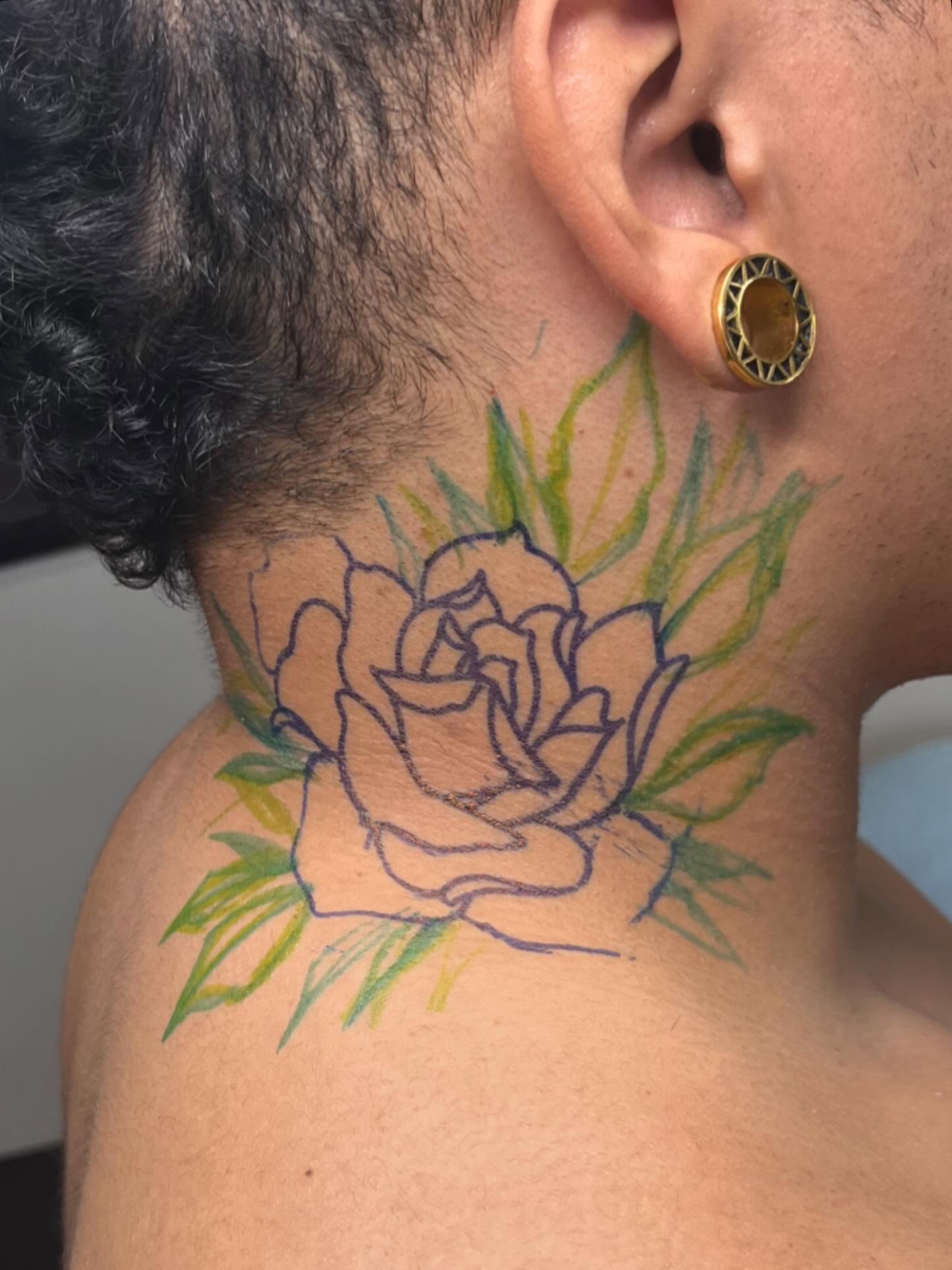 Rose new school tattoo on the neck by Katlyne Jones
