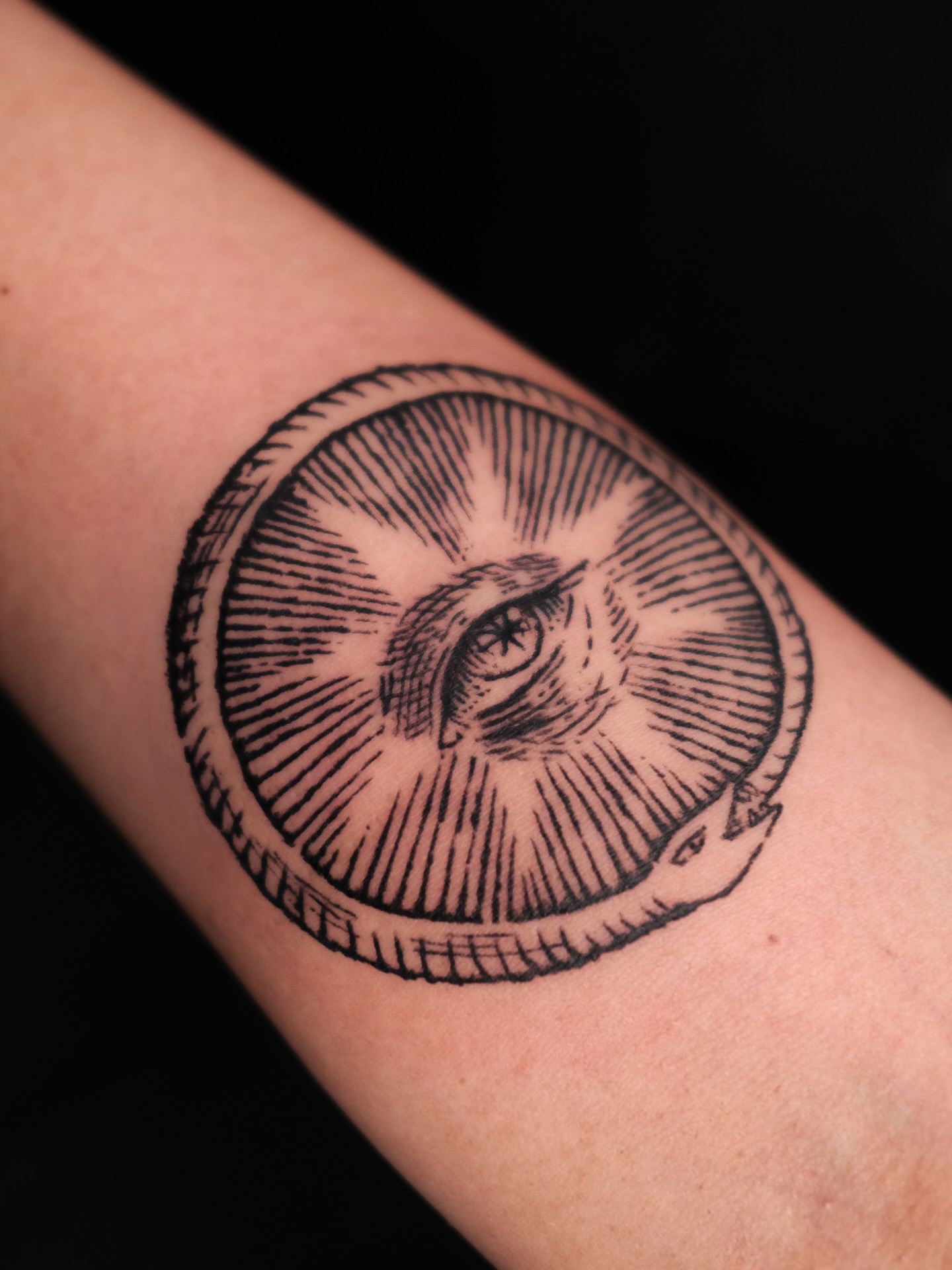 Eye black and grey tattoo on the forearm by ꜰʟᴏʀᴀ ᴡᴏᴏᴅᴄᴜᴛ ᴛᴀᴛᴛᴏᴏ