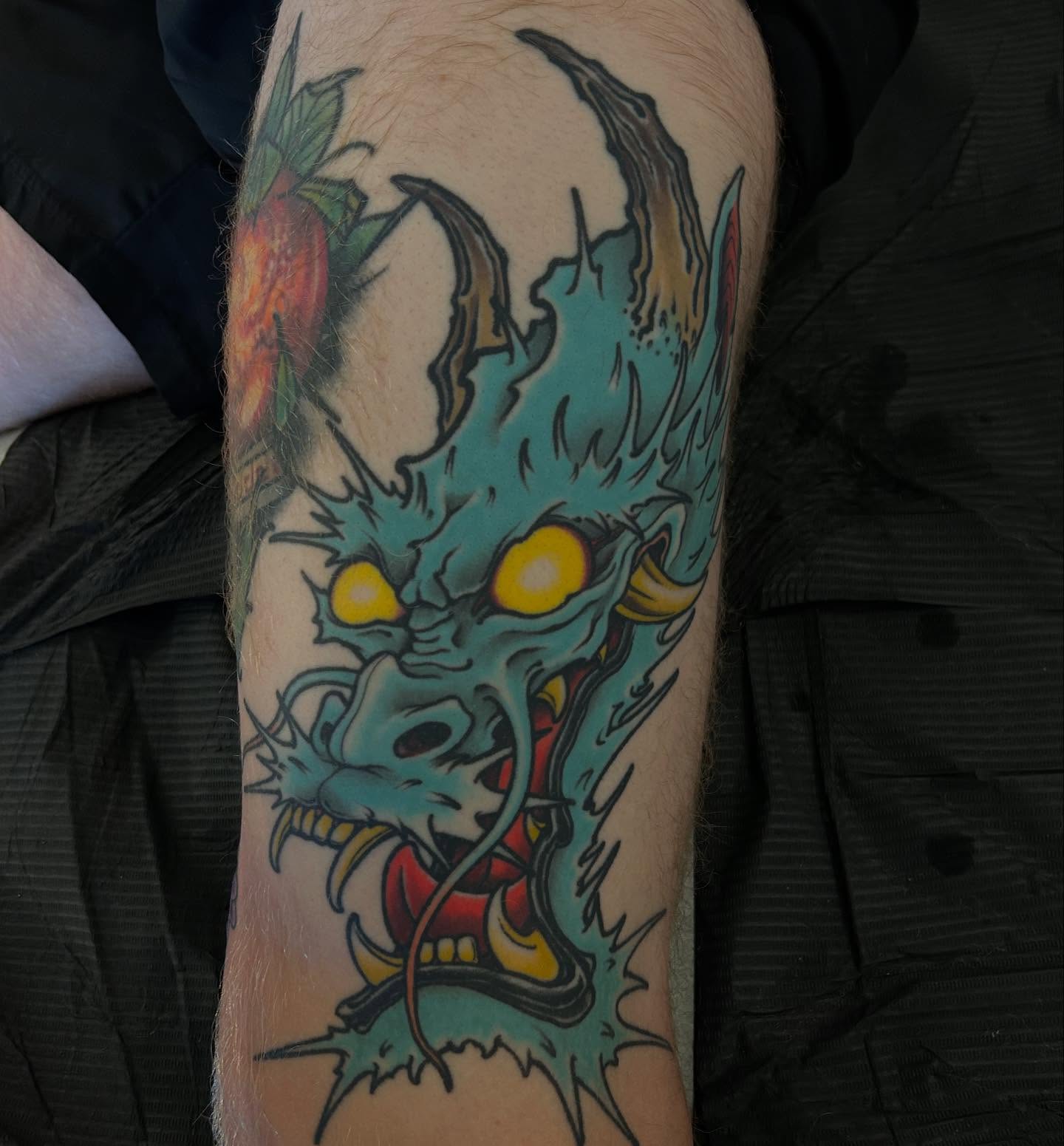 Demon head American traditional tattoo on the forearm by Craig Gardyan