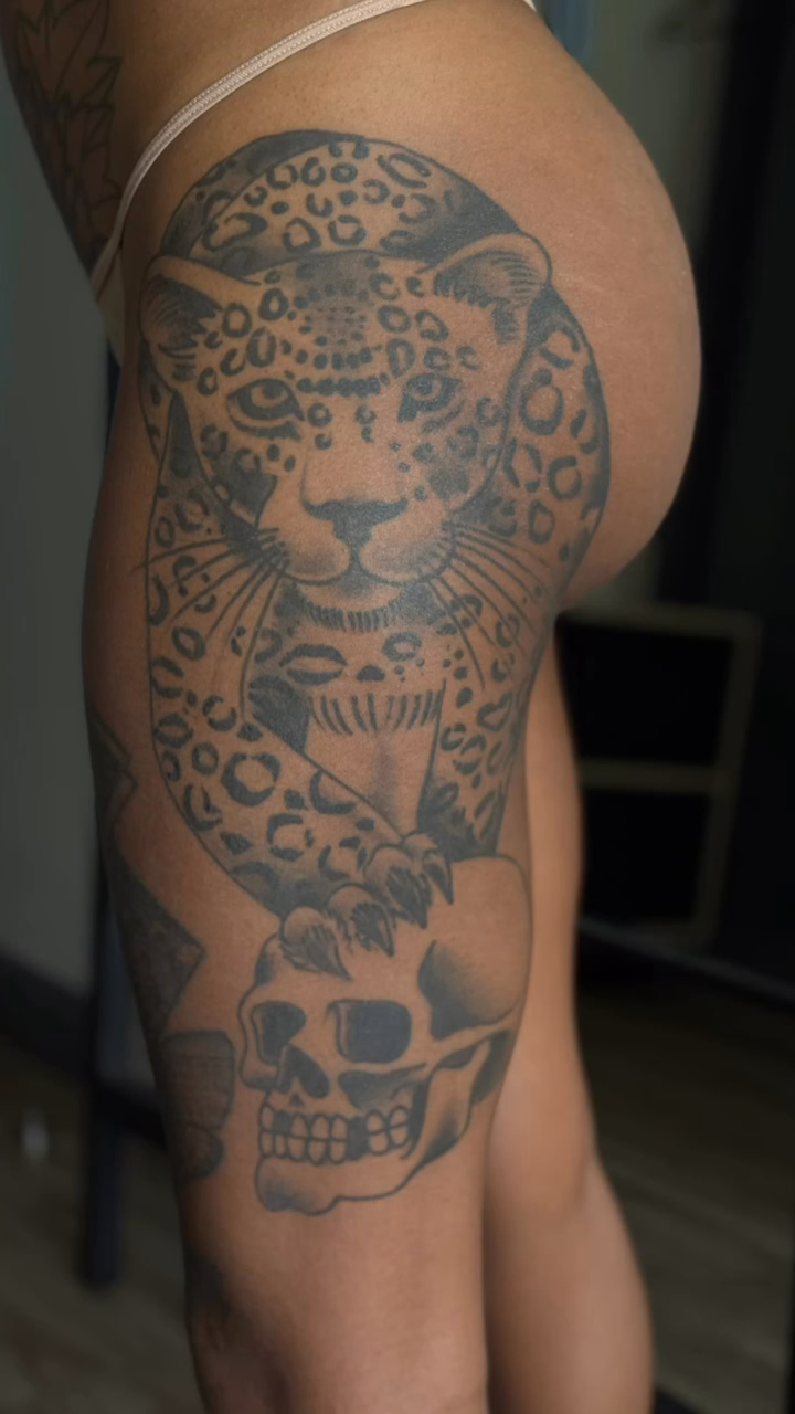 Jaguar and skull realism tattoo by Artist Clayco rikky