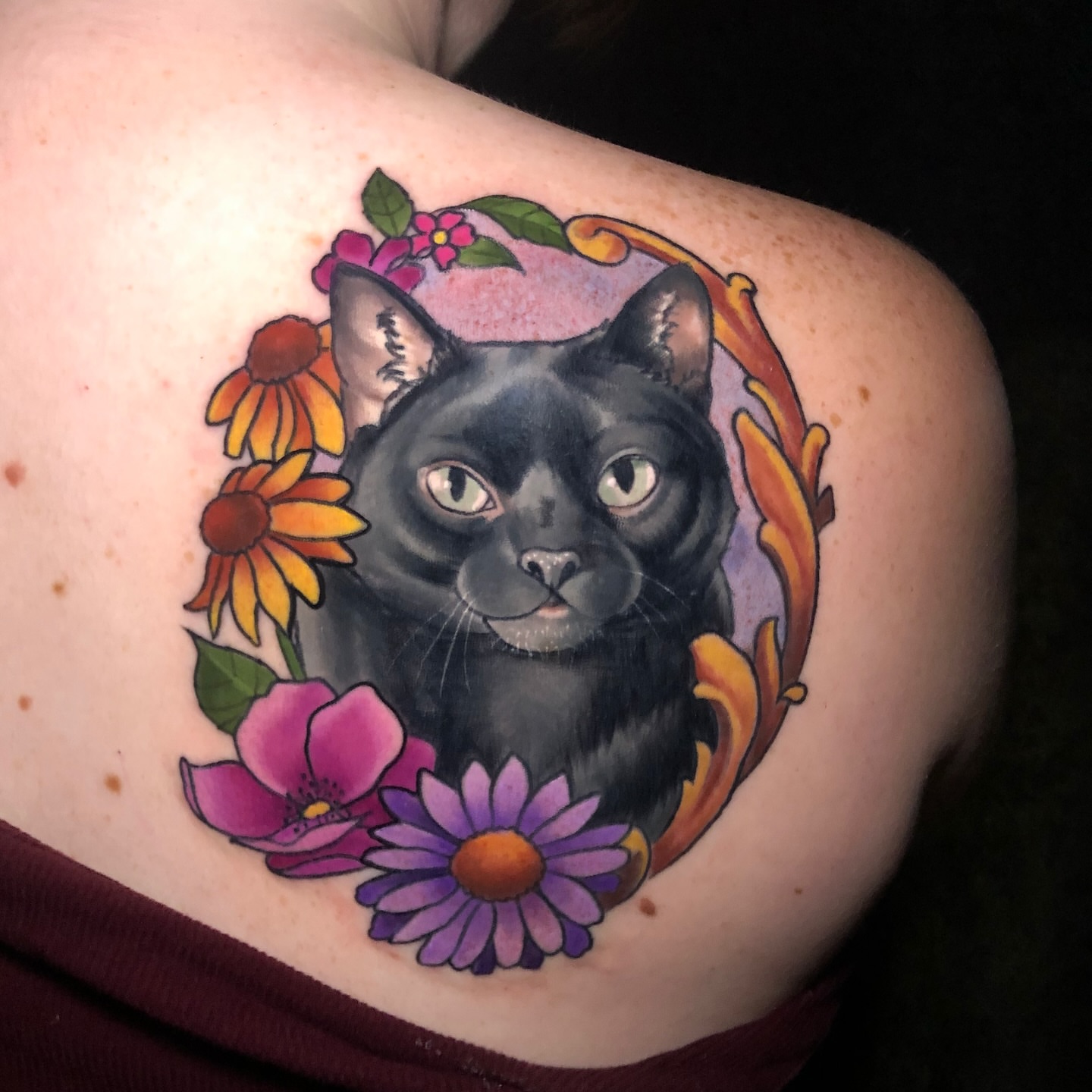 Black cat realism tattoo on the shoulder by Emily Walker