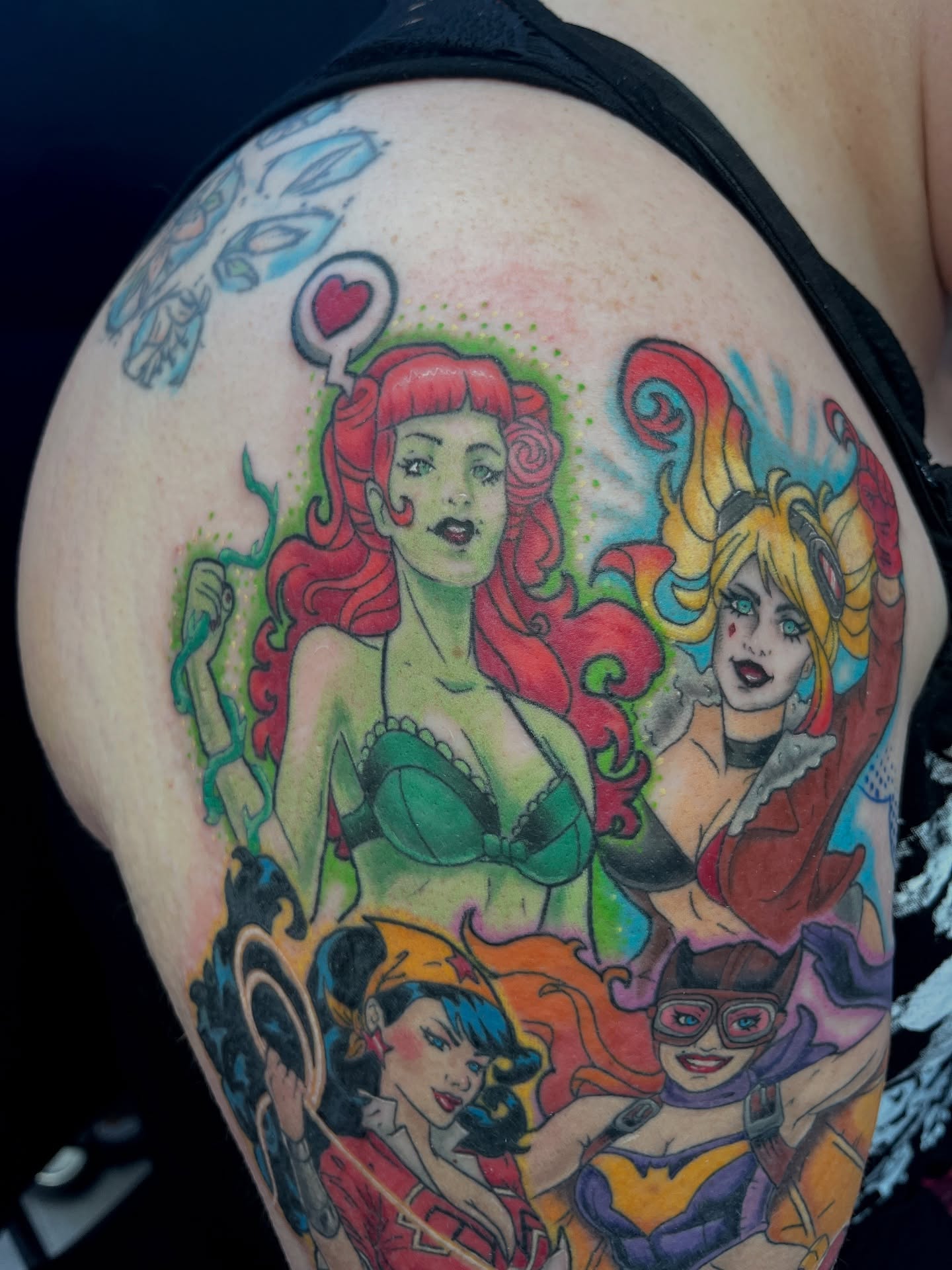 Female superheroes new school tattoo on the shoulder by Cheyanne Peck
