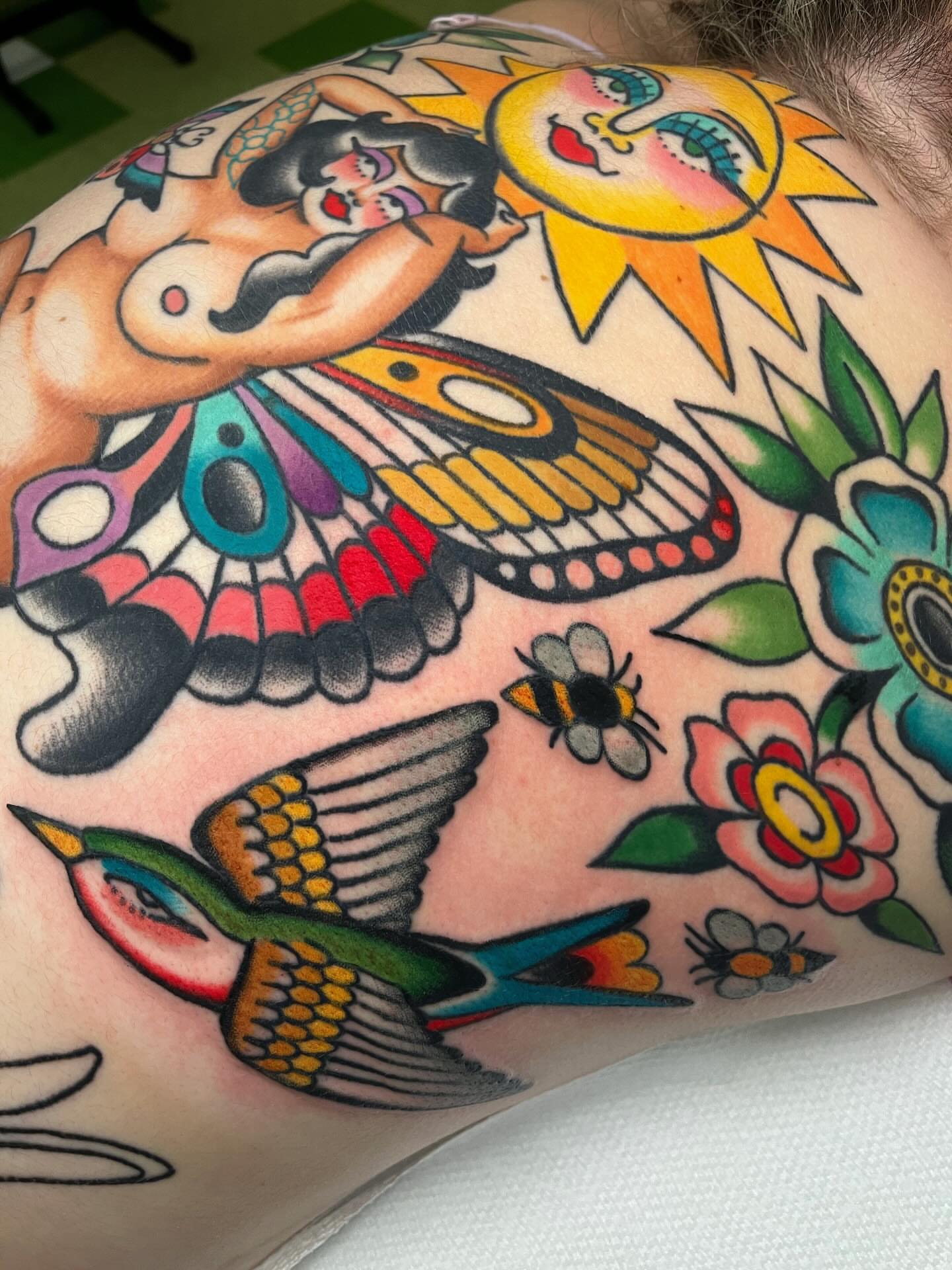 Woman with butterfly wings American traditional tattoo on the shoulder by ⭐️ Erin Bauer ⭐️