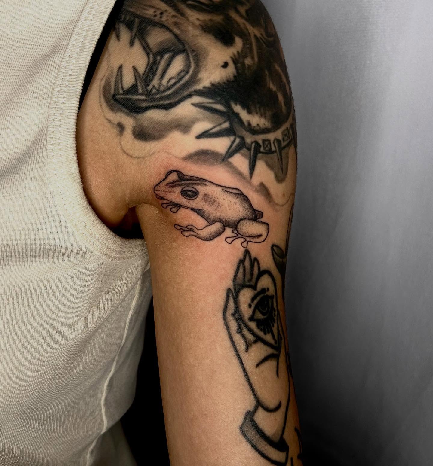 Frog black and grey tattoo on the forearm by Tash ๐โ๐ฉ