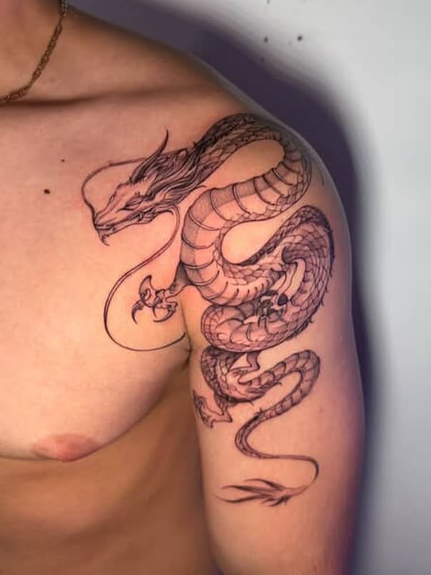 Dragon black and grey tattoo on the shoulder by aamora ꩜