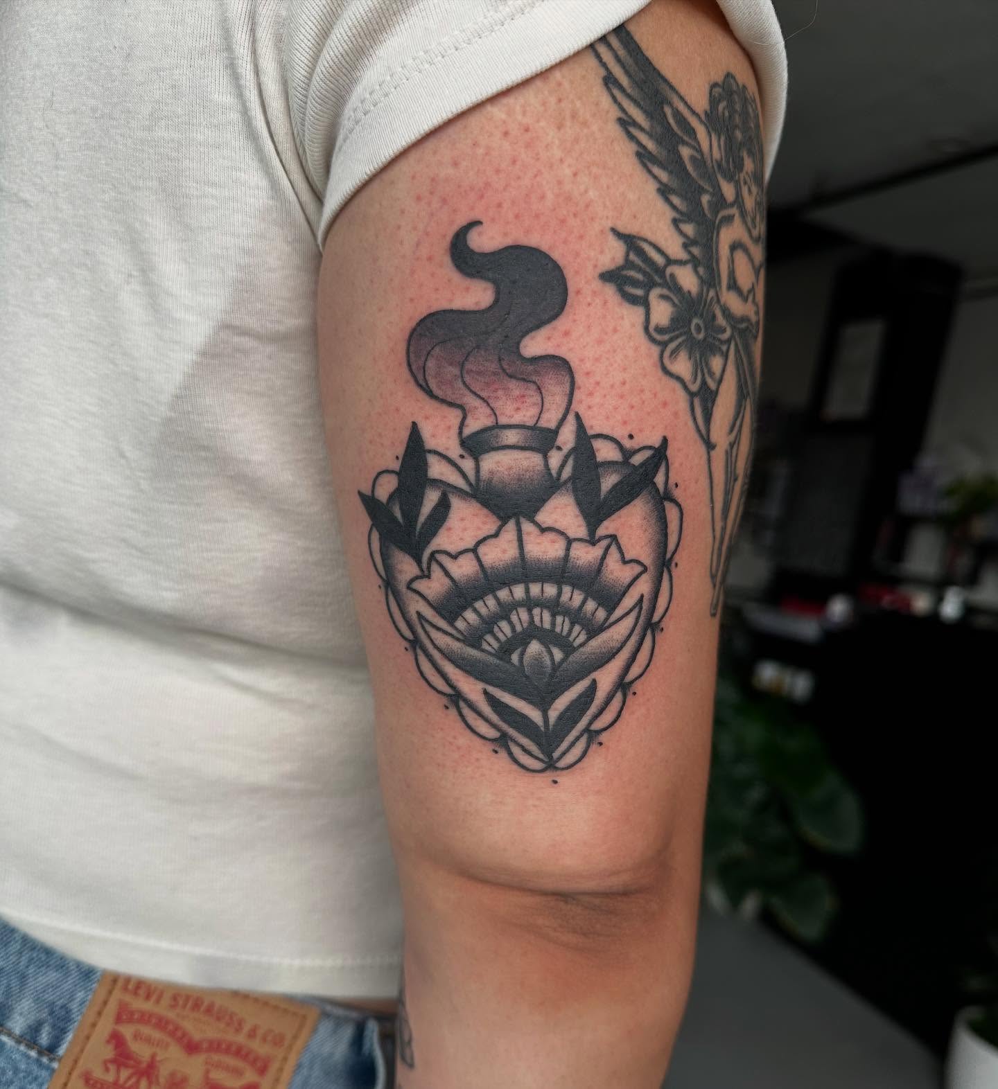 Floral arrangement with candle American traditional tattoo on the forearm by HannaH