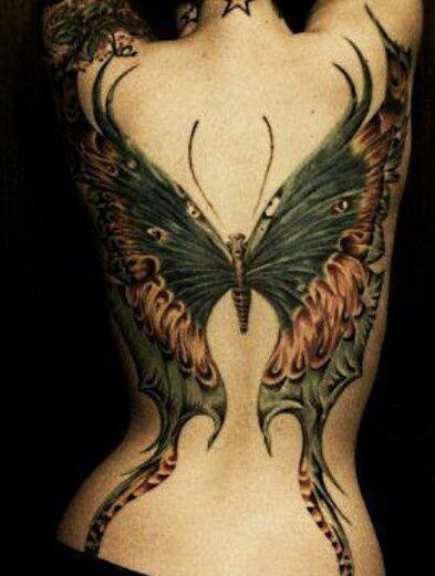 Butterfly new school tattoo on the back by Danika Brooke 🧿