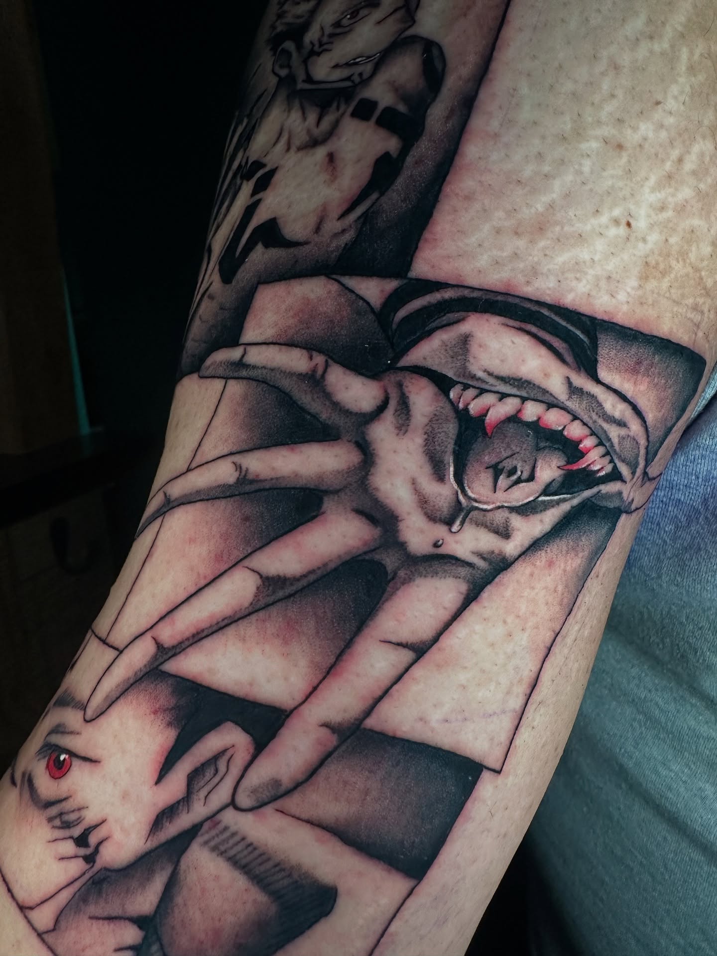 Shark attack realism tattoo on the forearm by Sam Minneci