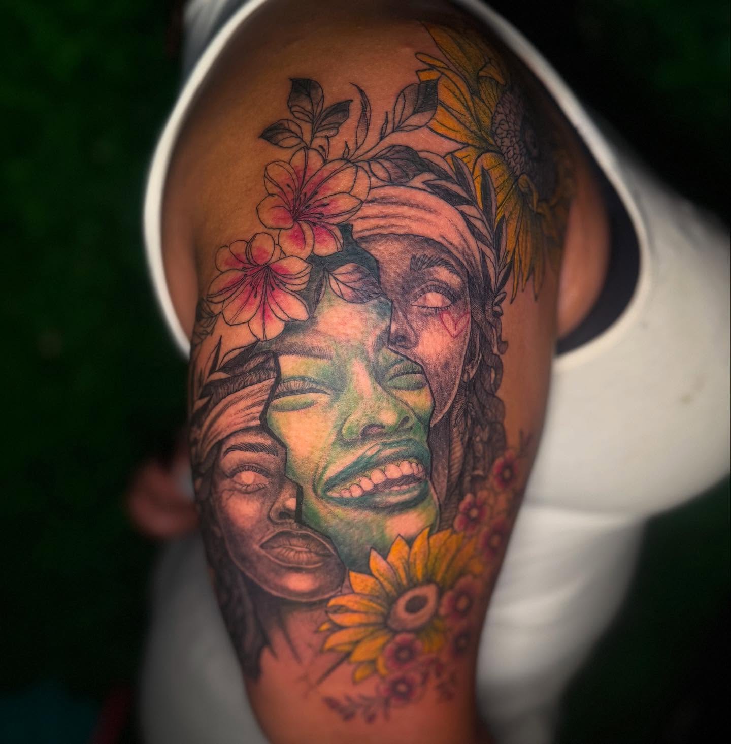 Faces with flowers realism tattoo on the forearm by Los Angeles Tattoo Artist