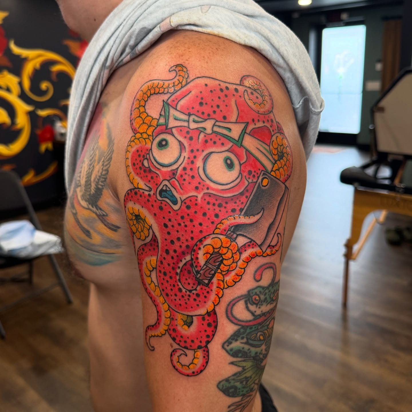 Octopus American traditional tattoo on the upper arm by Christopher  Cousins, Nashville, Tennessee